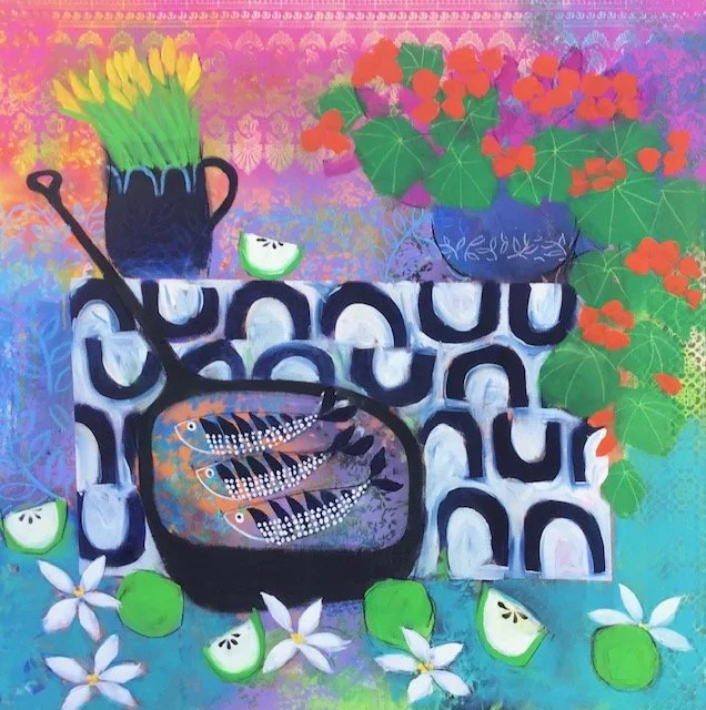 Colorful painting featuring a black kettle with three fish inside, surrounded by slices of kohlrabi with faces, green leaves, white flowers, a blue vase with orange and red flowers, and a bucket with yellow flowers.