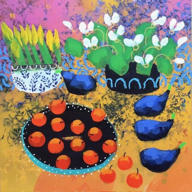 Colorful still life painting of potted yellow tulips, white and green flowering plants, and oranges on a black and blue plate on a yellow table.