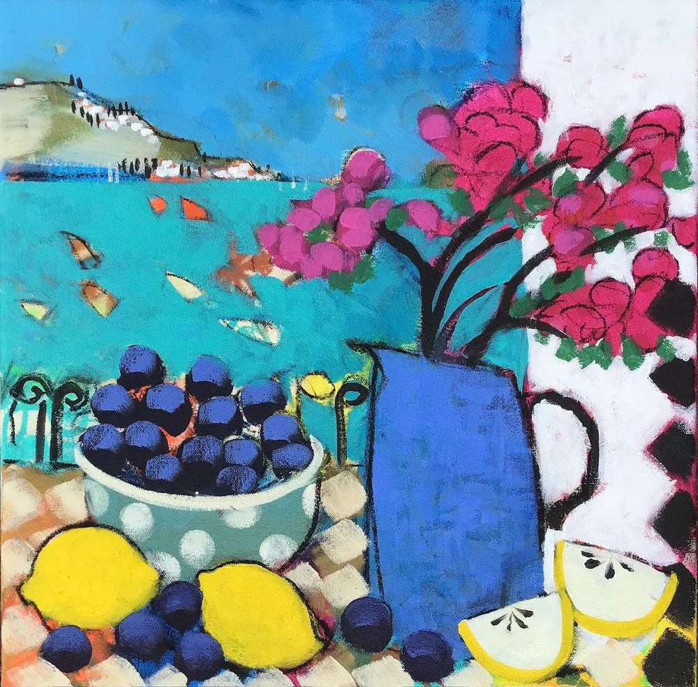 A colorful painting featuring a view of a seaside landscape in the background, with a large blue vase holding pink flowers, a bowl of blueberries, two lemons, and lemon slices in the foreground.