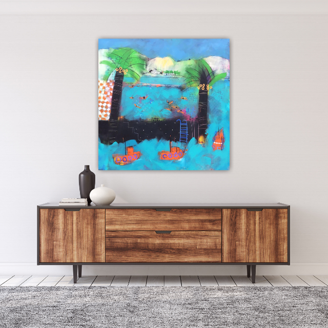 Abstract painting of a harbor scene with boats, trees, and water hung above a wooden sideboard.
