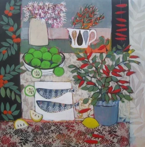A still life painting featuring a purple vase with pink spiky flowers, a white mug with a dark pattern holding orange flowers, a blue bowl of green limes with a lemon slice, a white cloth with fish and lime slices, a lemon, and red peppers in a blue pot. The background includes patterned fabrics and leafy borders.