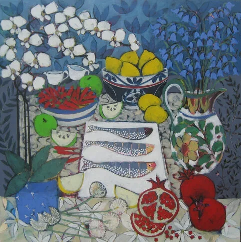 A colorful still life painting of a table with various fruits, vegetables, and decorative bowls, including pomegranates, lemons, apples, cucumbers, and flowers, against a leafy blue background.