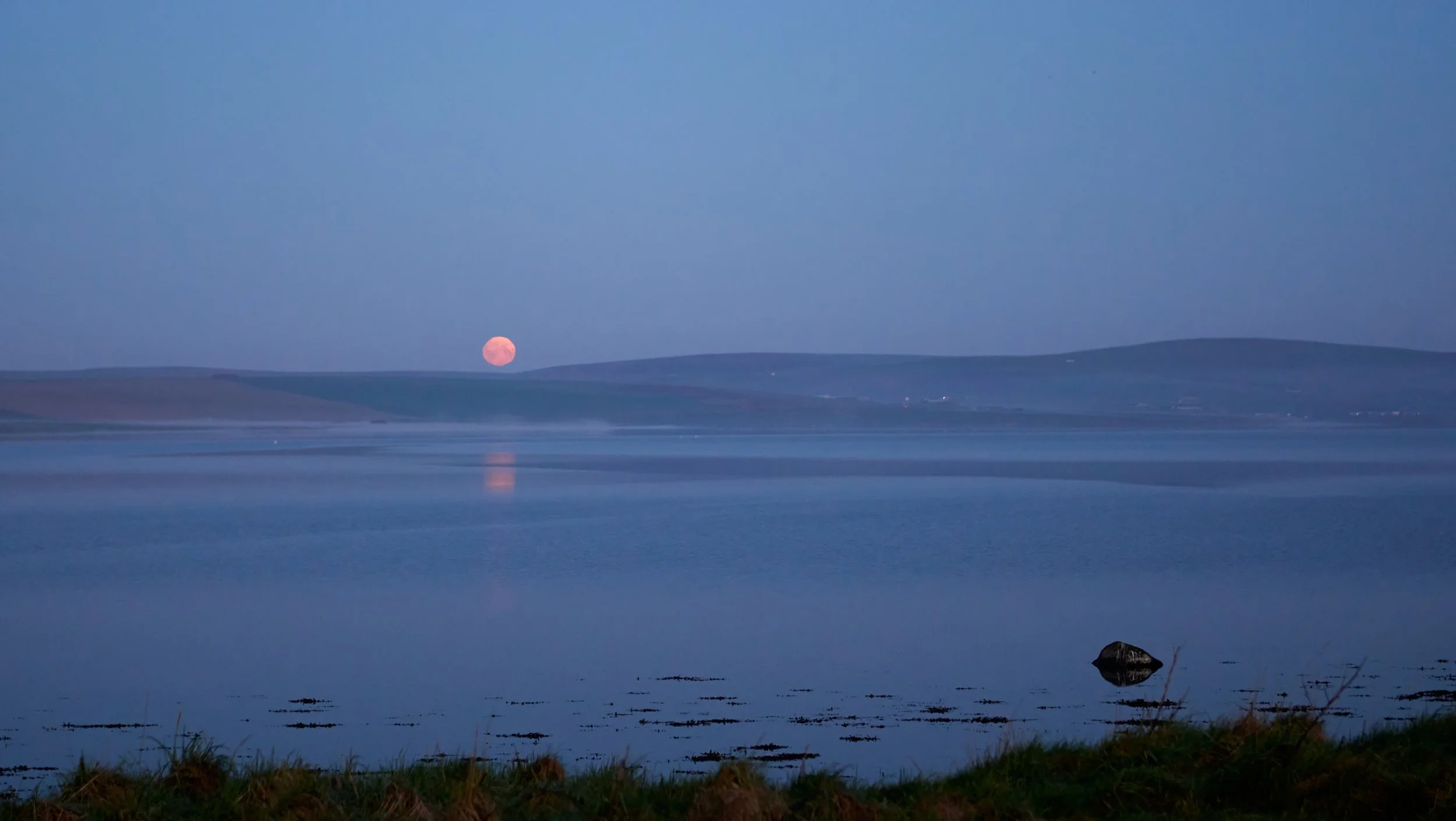 Moon setting over Orkney