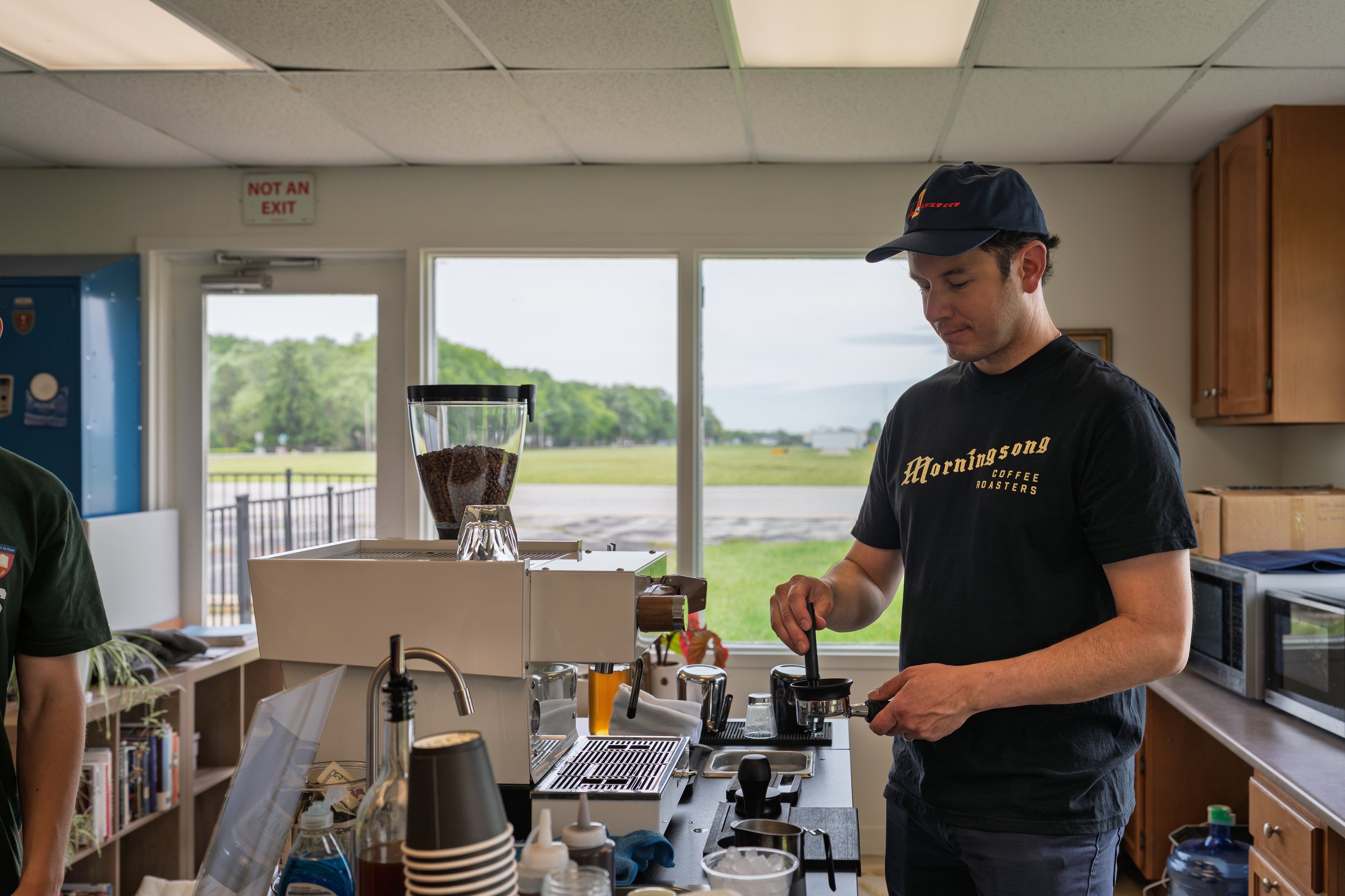 Preamble Coffee Cart Catering in Fort Wayne, Indiana serving premium espresso drinks to guests at a private event with commercial equipment.