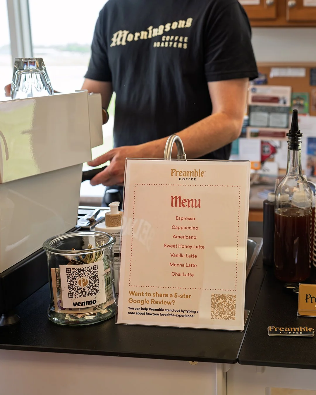 Preamble Coffee Cart Catering in Fort Wayne, Indiana serving espresso drinks like iced lattes to happy and satisfied guests.