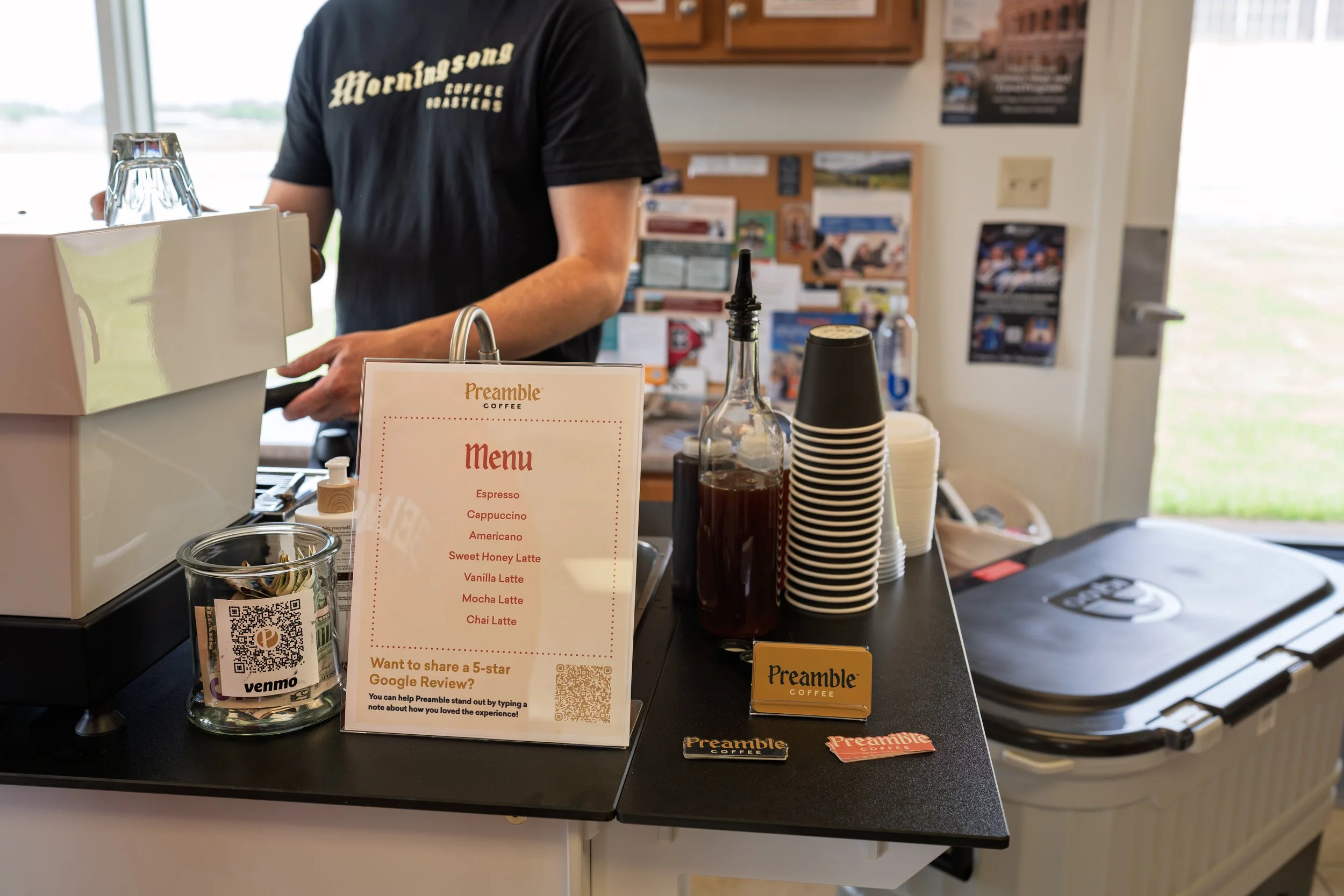 Preamble Coffee Cart Catering in Fort Wayne, Indiana preparing premium espresso drinks for guests at a private event with a full menu of delicious options.