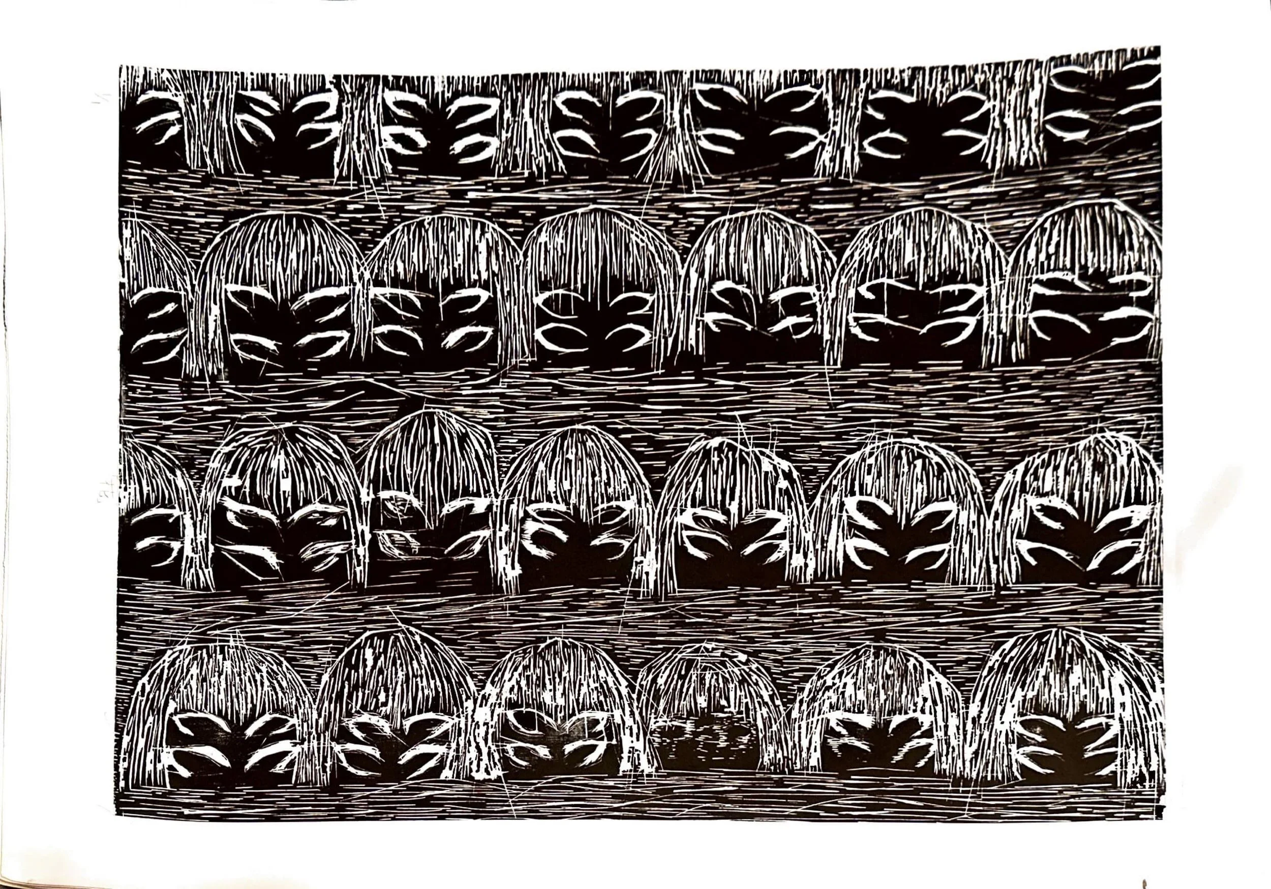 Black and white print artwork featuring rows of stylized faces with closed eyes and long hair, arranged in a repetitive pattern.