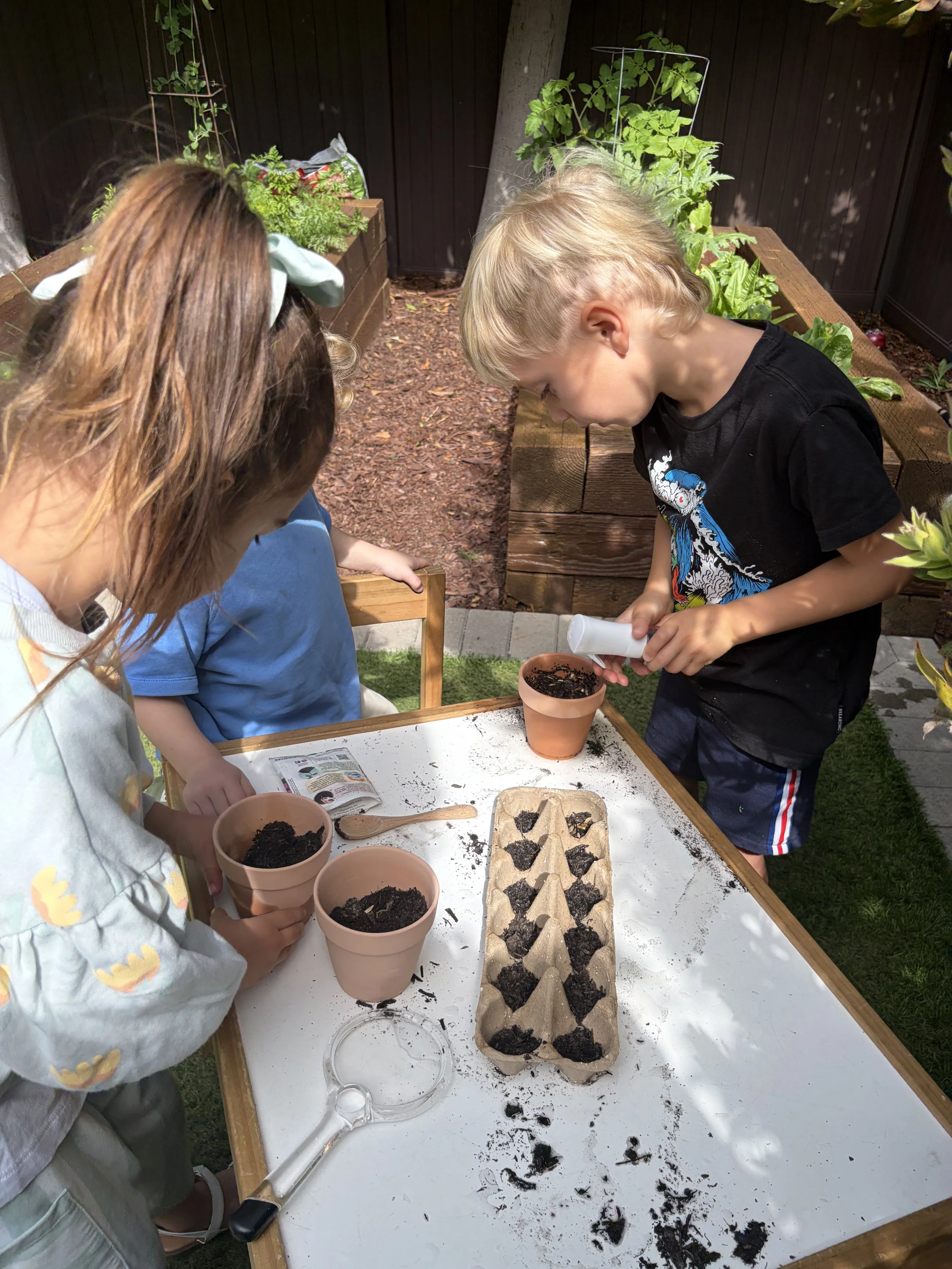 Nature-based preschool in Costa Mesa teaches kid to plant seeds and explore outdoors.