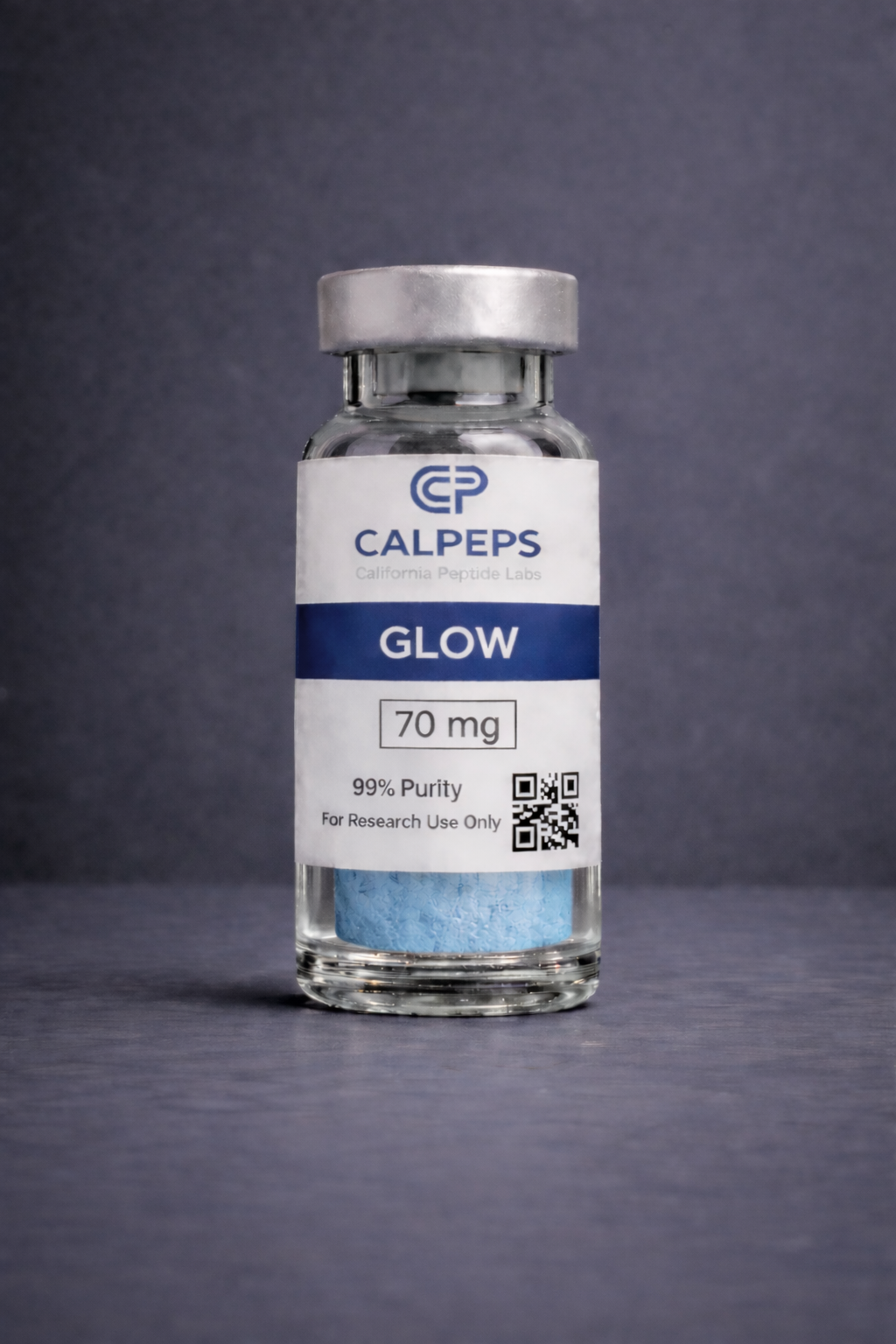 Blue vial on textured surface.png