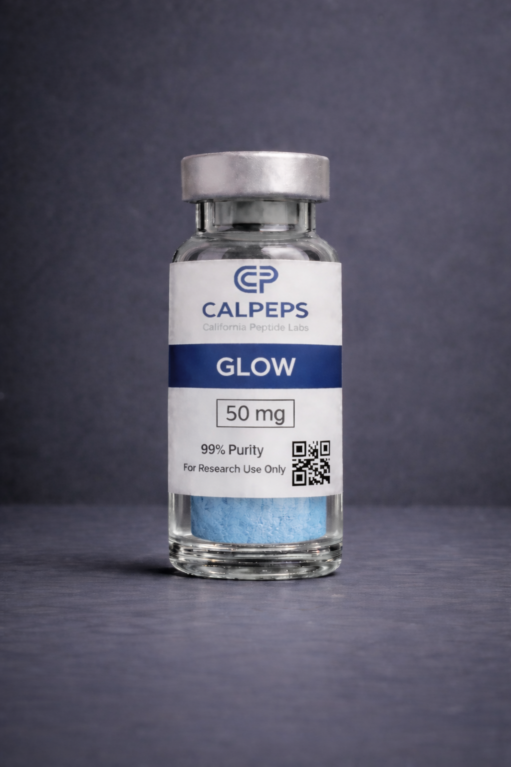 Blue powder in a glass vial.png