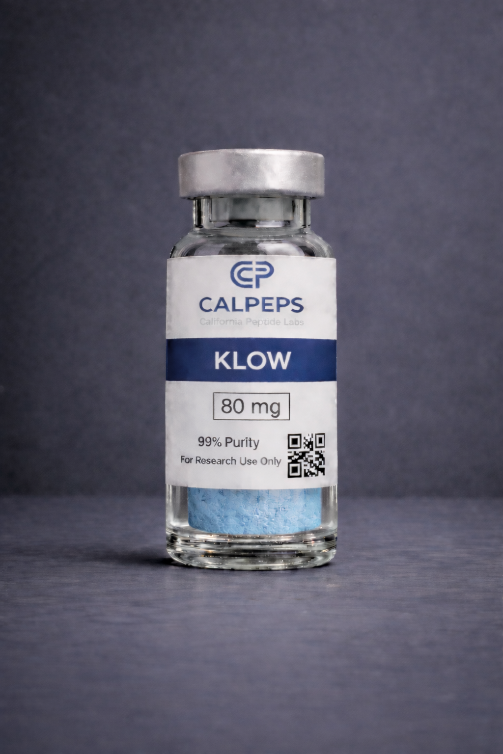 Glass vial with blue powder and label.png