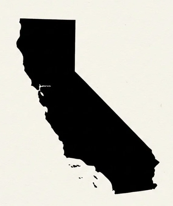 Black silhouette of the state of California with the outline filled in, on a white background.