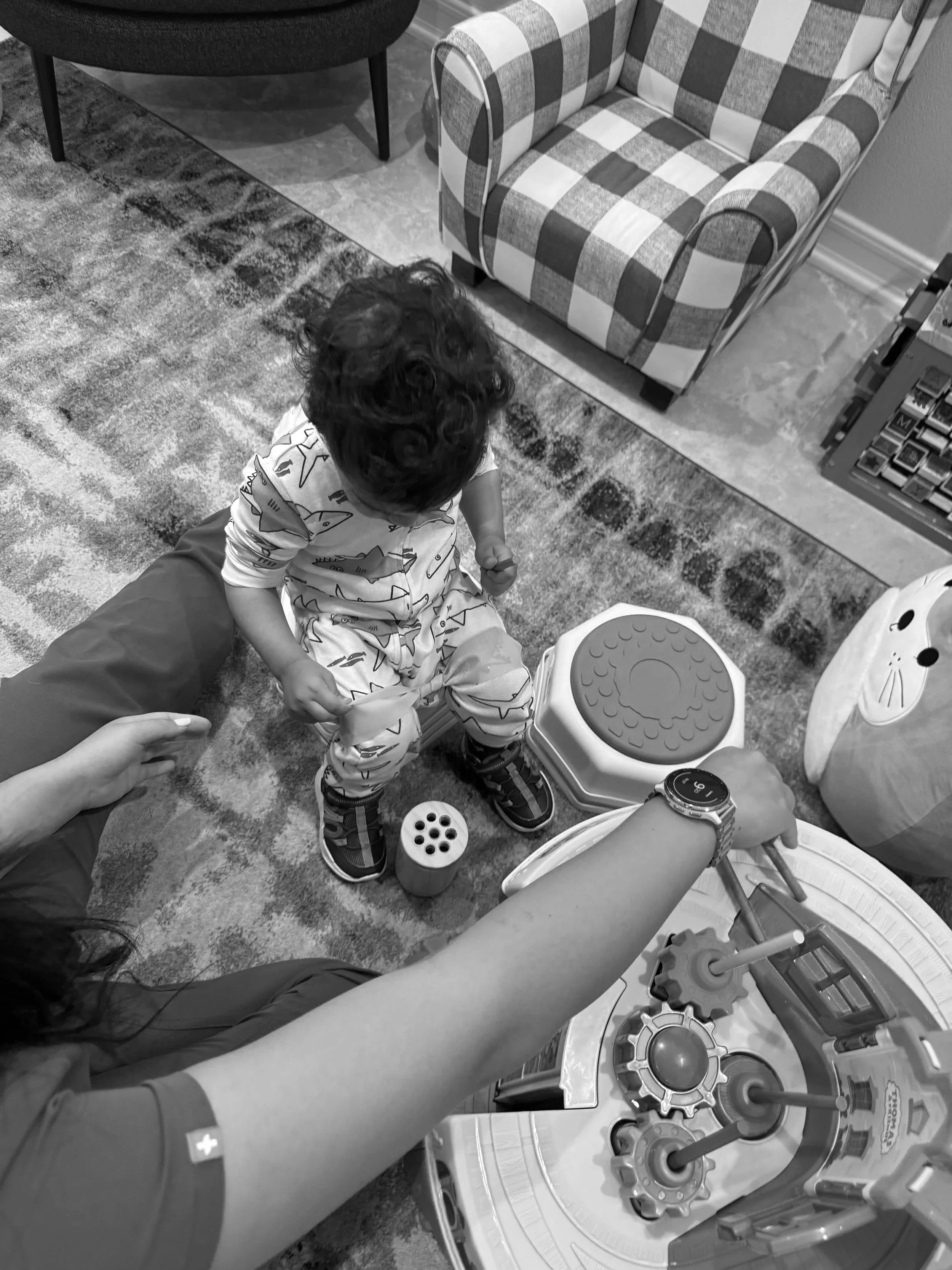 Pediatric physical therapy session focused on infant gross motor development, play-based intervention, and developmental milestones.