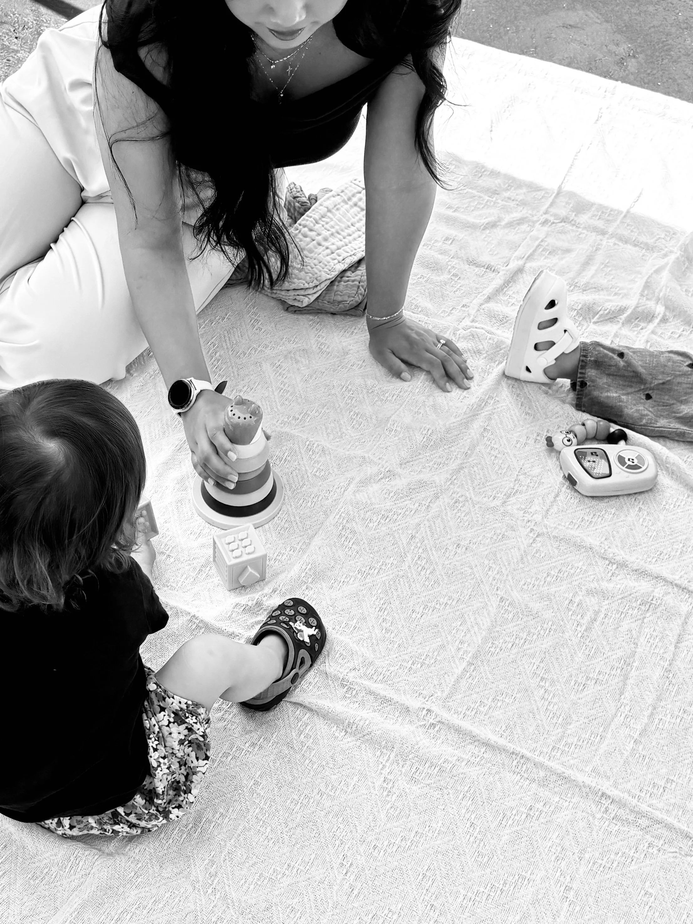 Play-based pediatric physical therapy promoting sitting balance, coordination, and gross motor development for young children.