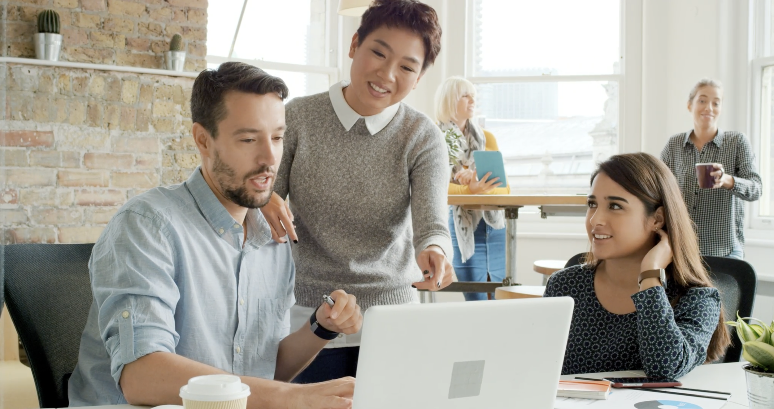 Marketing Staff Collaborating.png