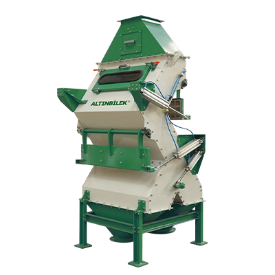Industrial machine with green and white parts labeled 'ALTMNIBLEK'