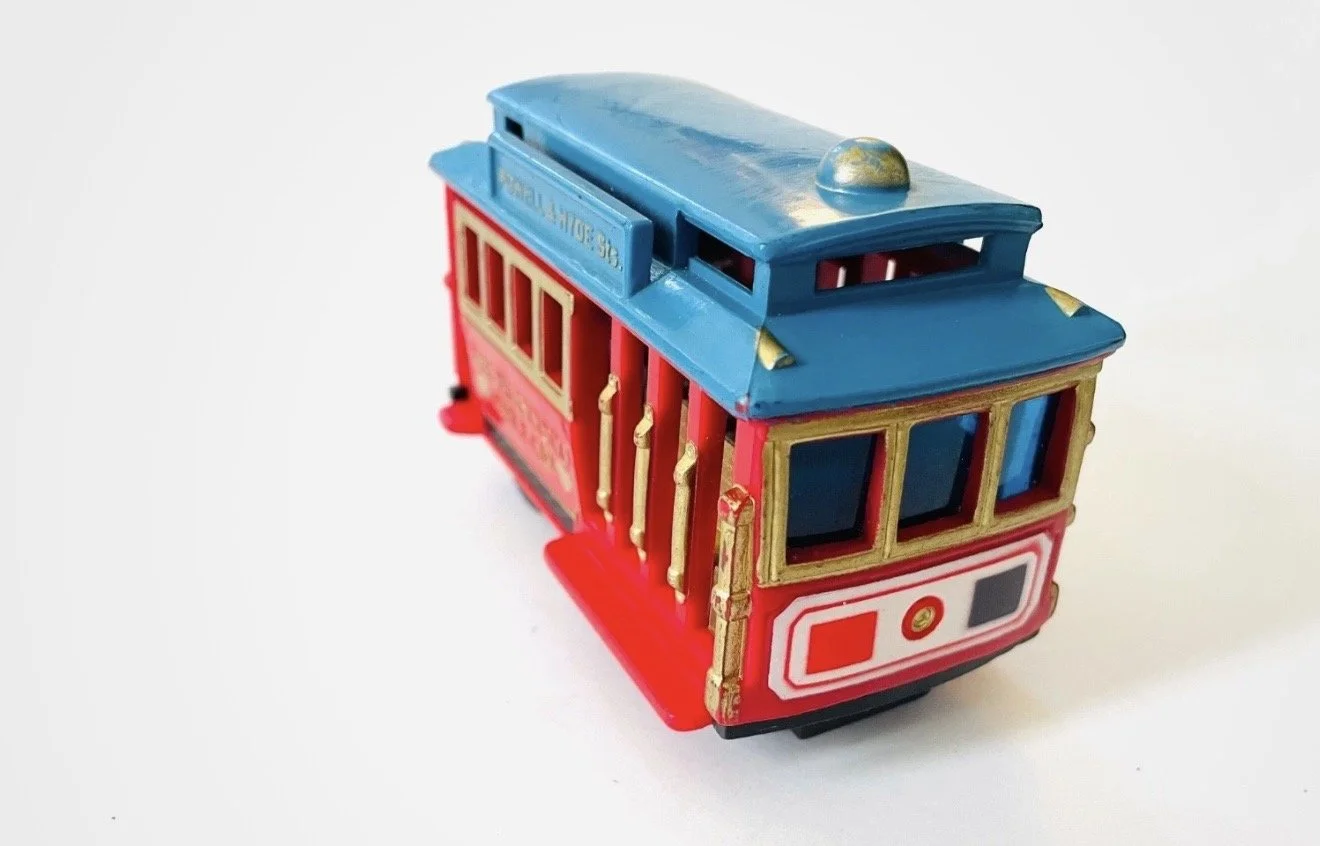 Smith Novelty Co San Francisco Cable Car Friction Toy Powell & Hyde Streets, red with blue roof