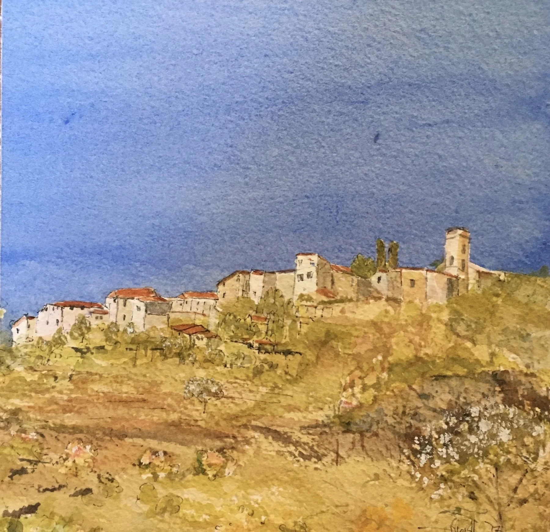 Watercolor painting of a hillside village with white buildings, red roofs, and a blue sky.