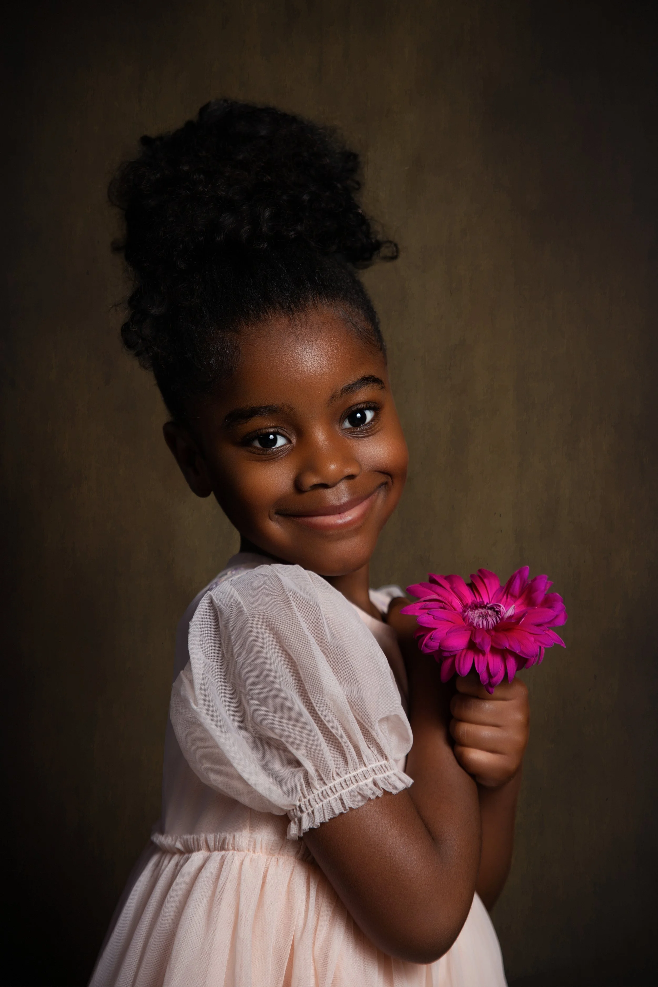 Elegant at-home portrait of a young girl, highlighting personality and natural expression in Bolton