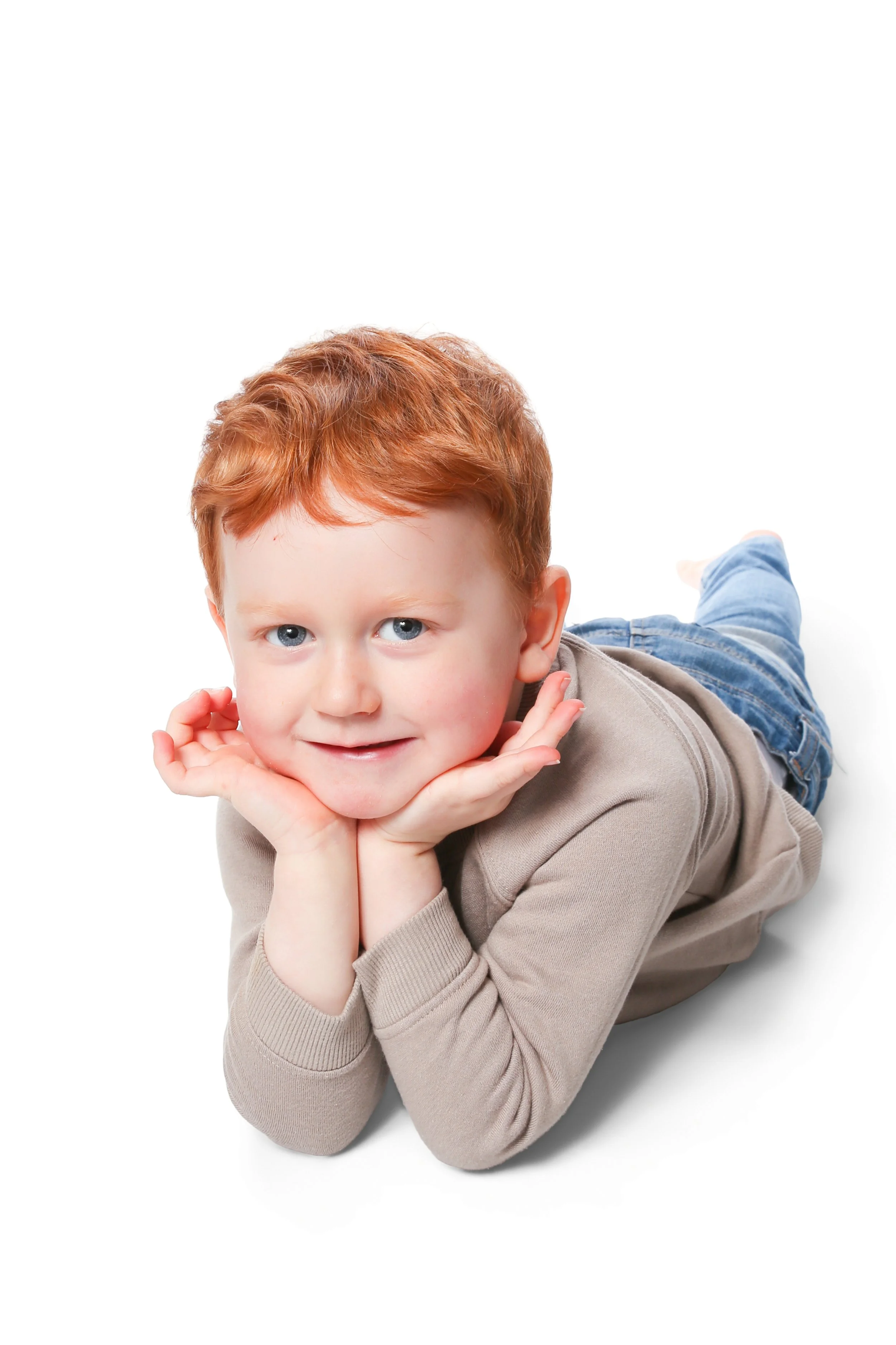 Children enjoying a professional and fun nursery portrait photography session in Manchester