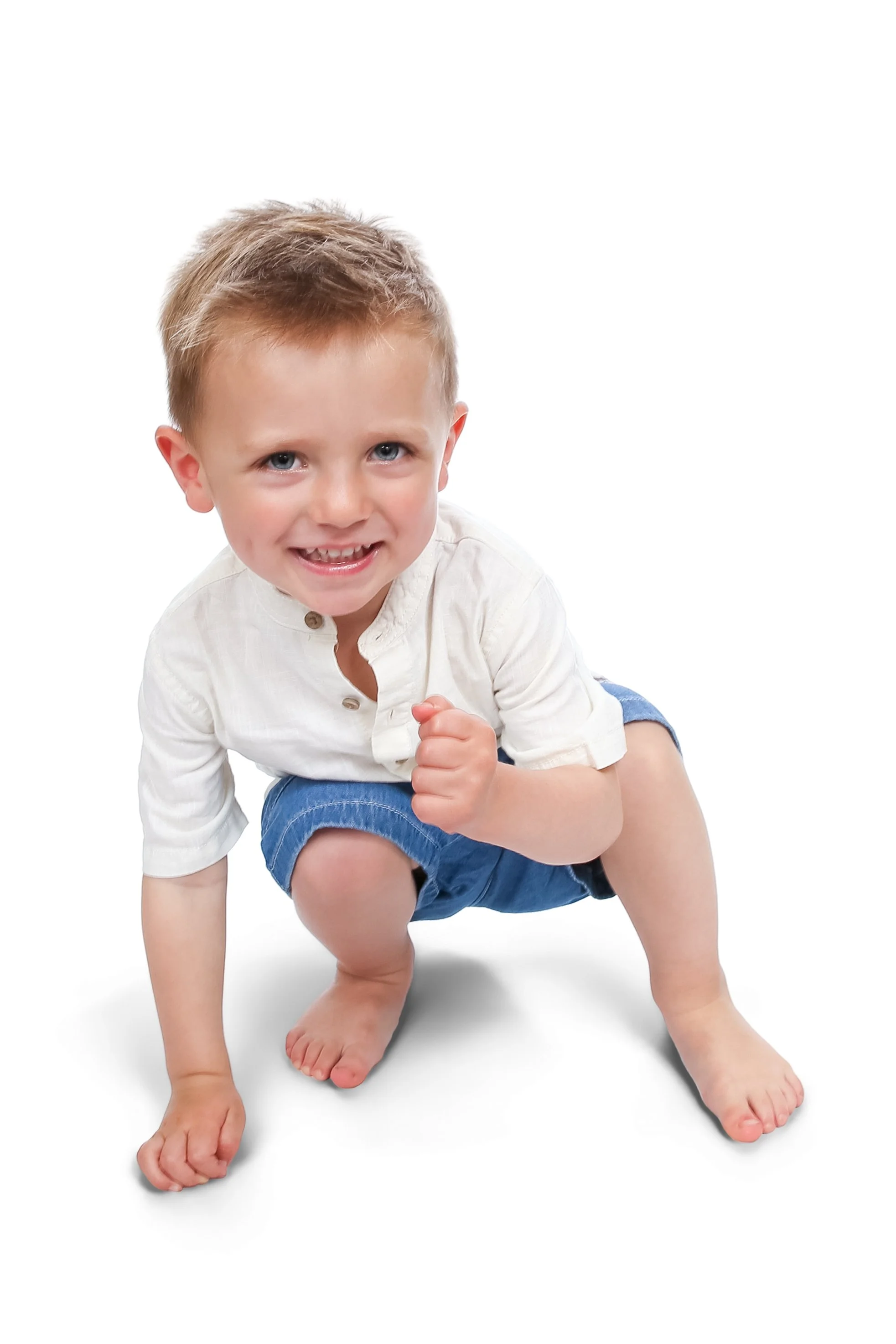 nursery child posing for a professional photography session in an Oldham day nursery