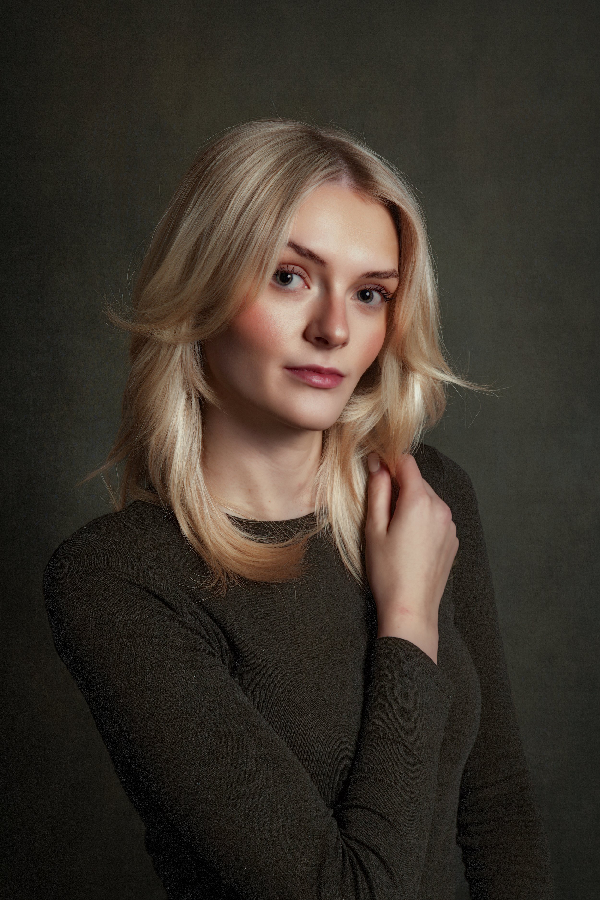 Timeless fine art portrait of a young girl captured in soft natural light at her home in Bury, Greater Manchester