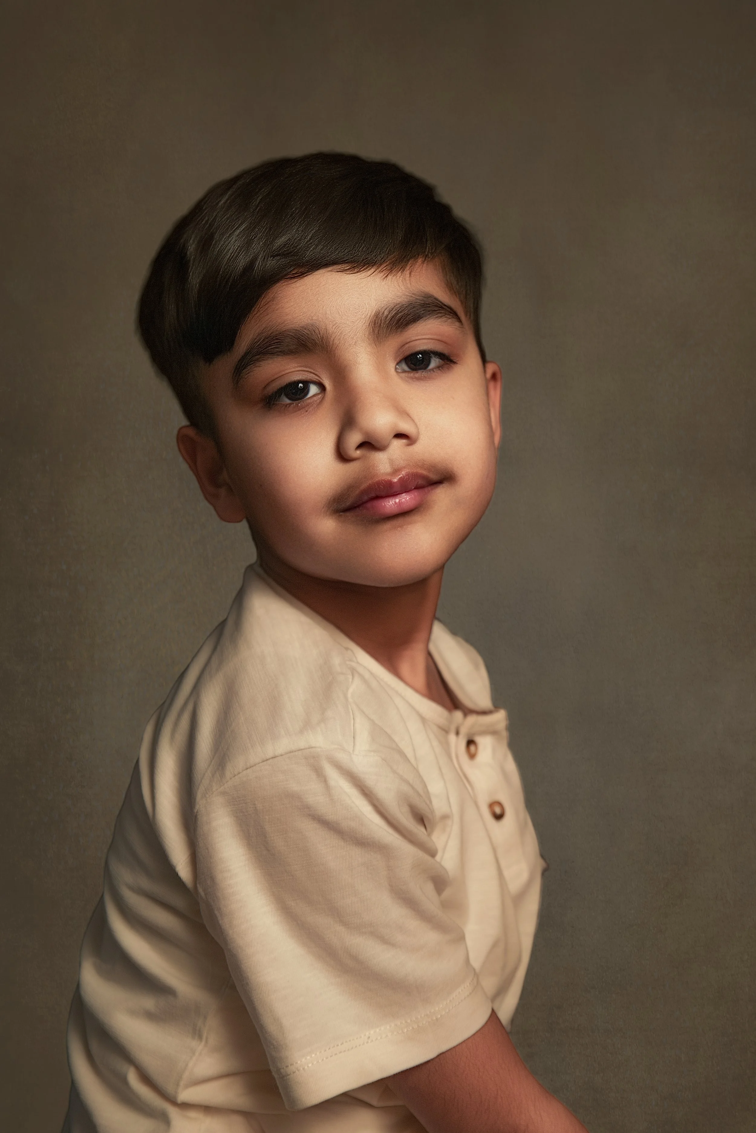 Fine art children's portrait of young boy photographed in Manchester with classic, refined style