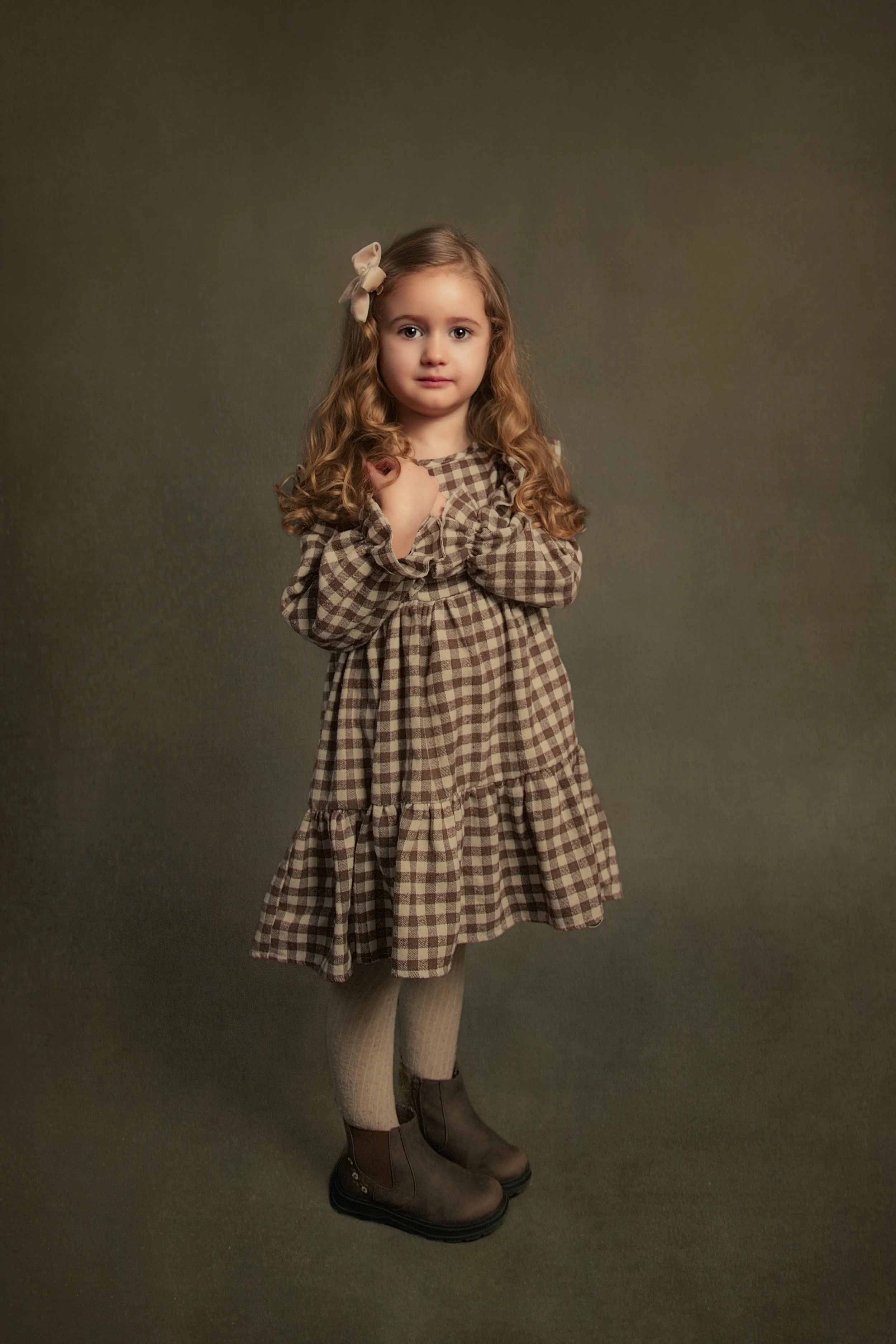 Fine art children's portrait of young girl with soft, timeless styling in Manchester