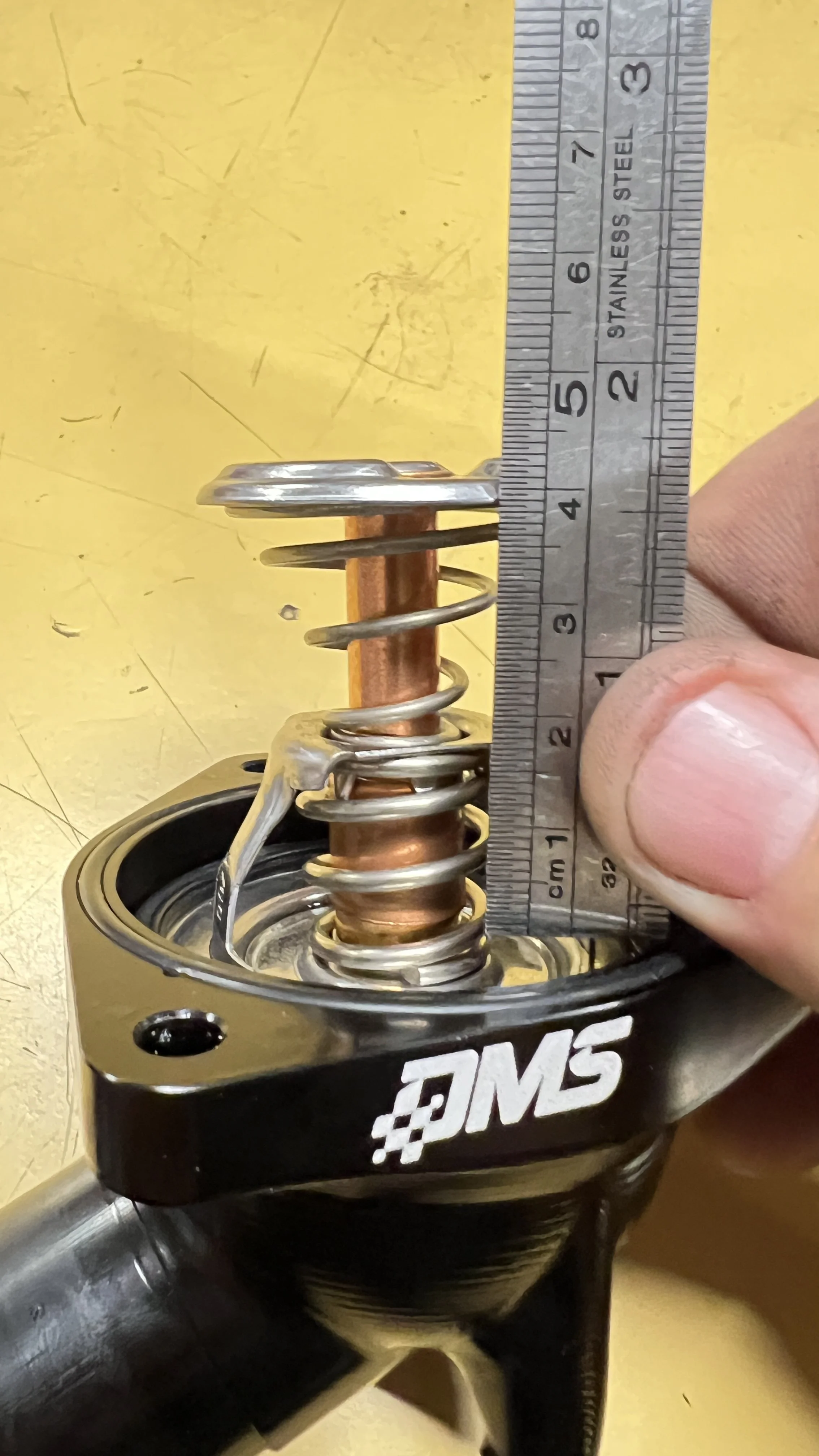 DMS Billet housing with LS3 Thermostat compared with LT4 Aluminum Thermostat OEM housing