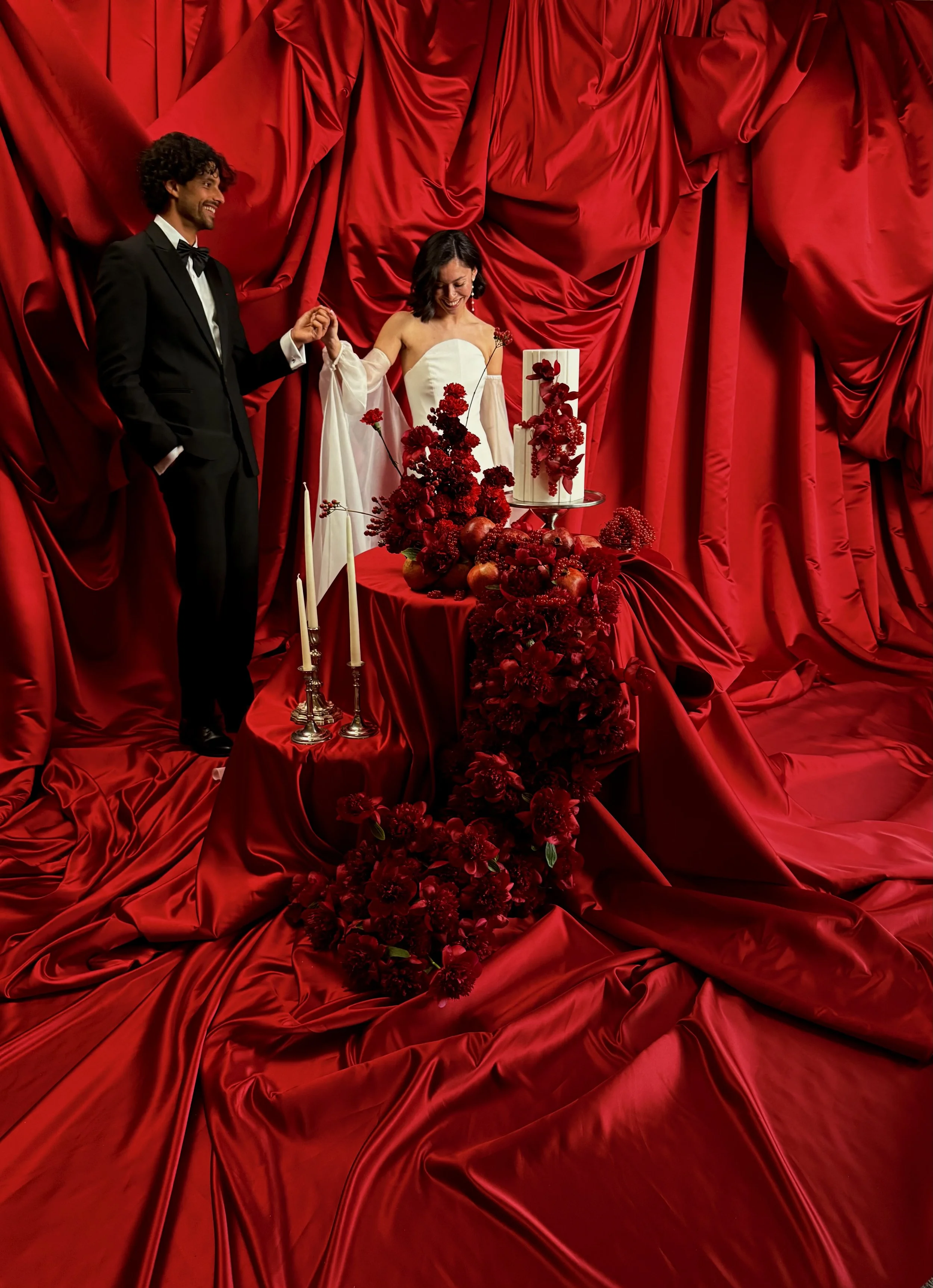 Red wedding backdrop cake table styling.jpeg