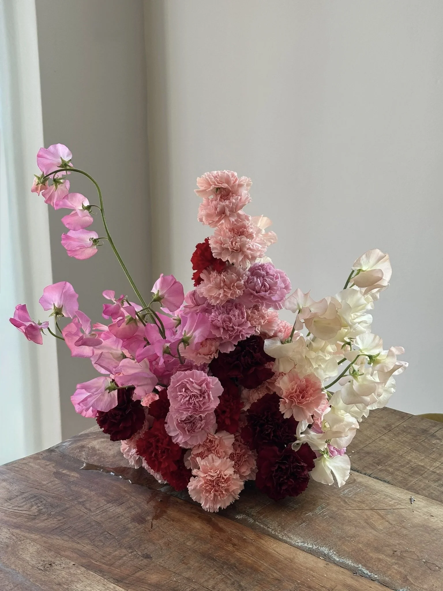 Pink event flowers sculptural arrangement.jpg