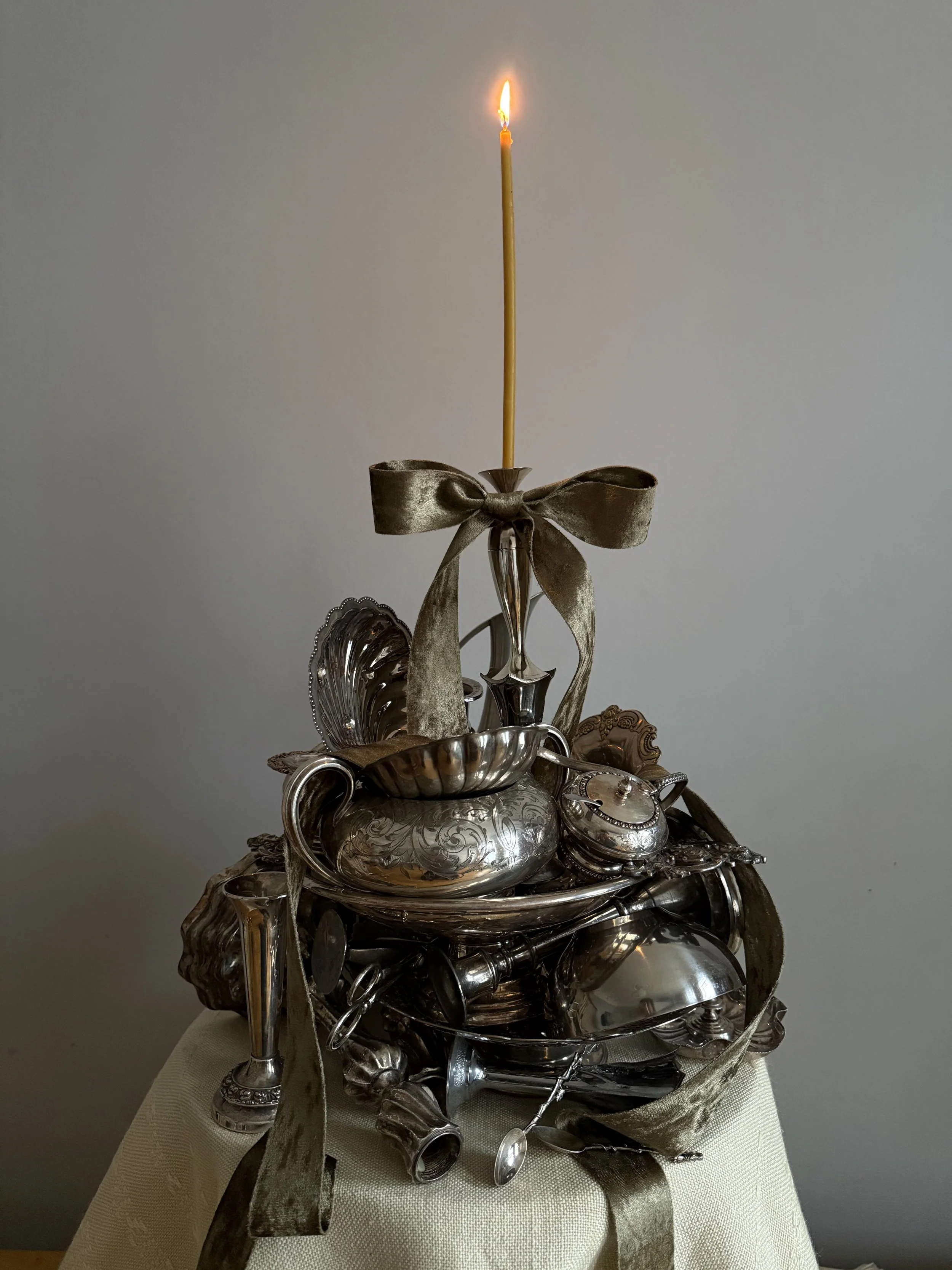 Silver arrangement sculpture table concept Christmas arrangement.jpeg