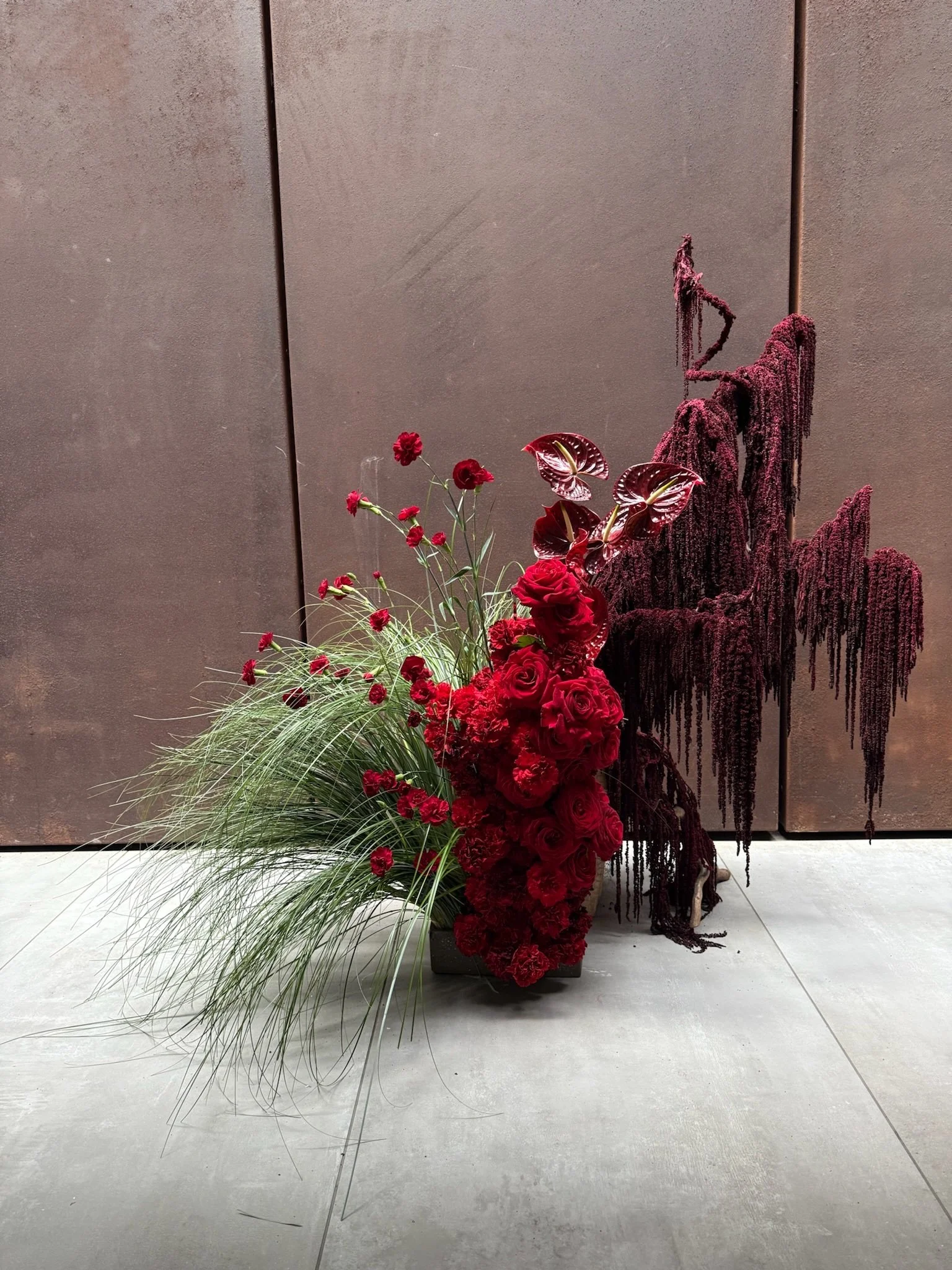 Red burgundy flower installation roses carnations amaranths sculpture.jpeg
