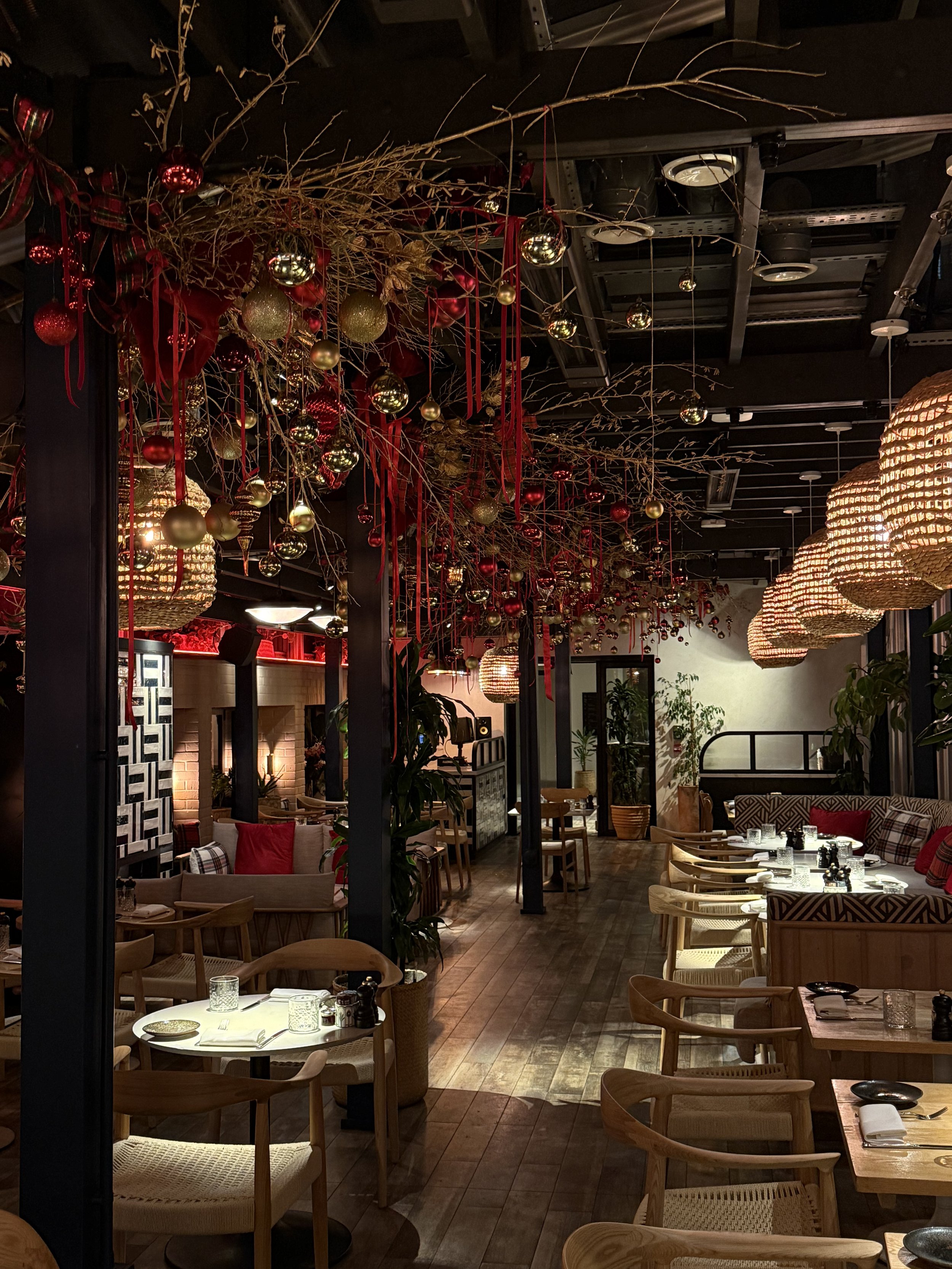 Red and gold Christmas installation ceiling baubles gold branches .jpeg