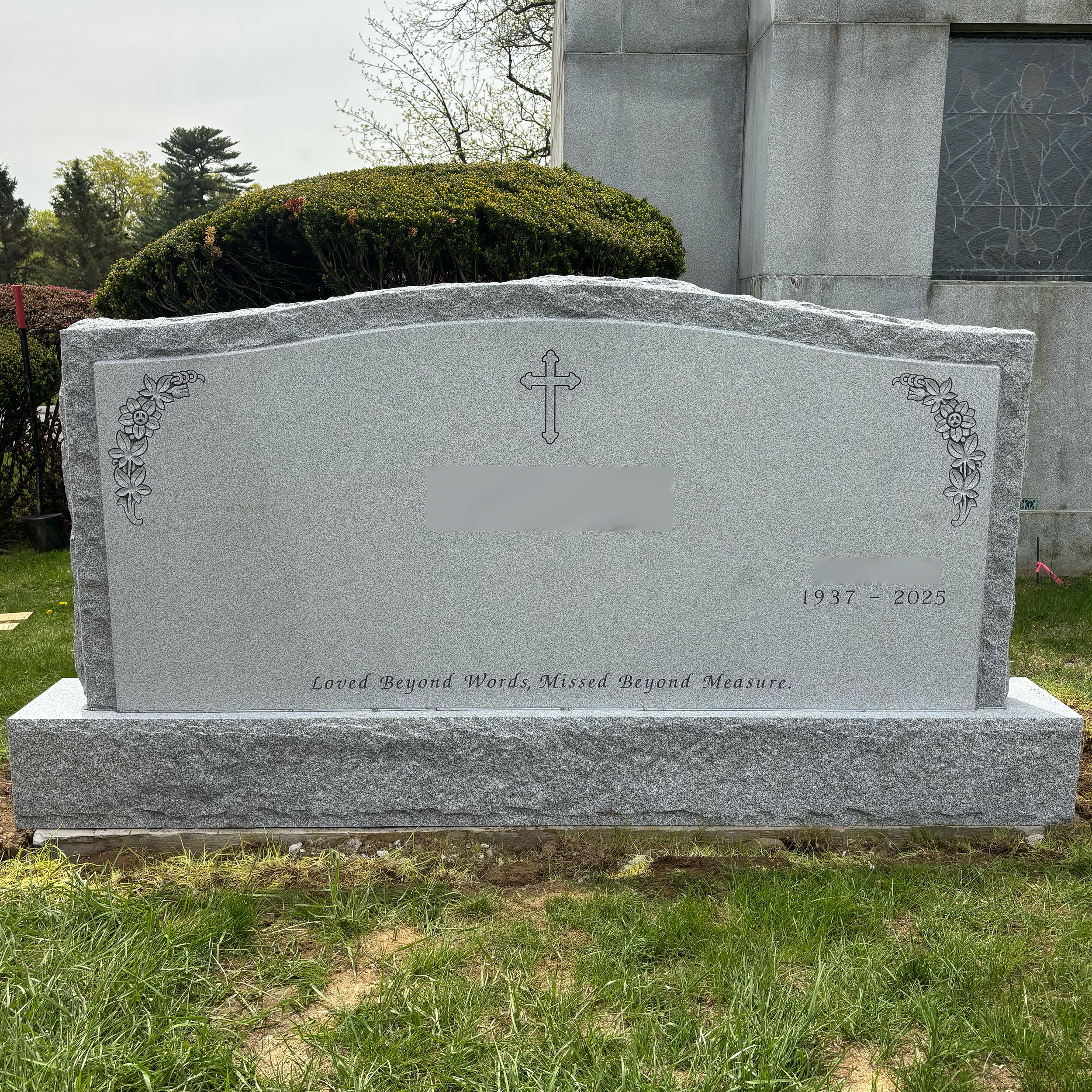 Custom granite family monument with personalized inscriptions