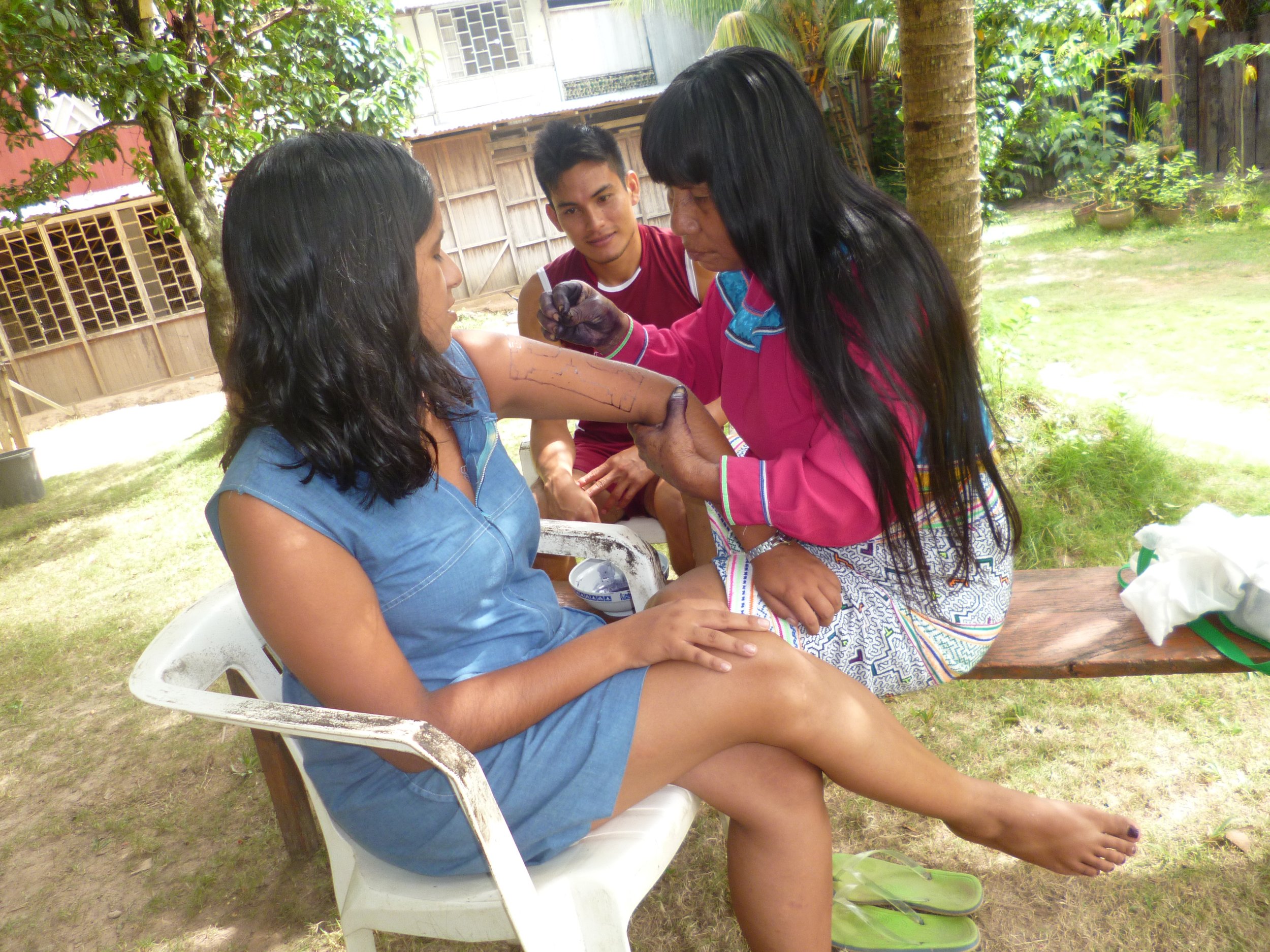 Teresa painting Shipibo designs on my body (2013)