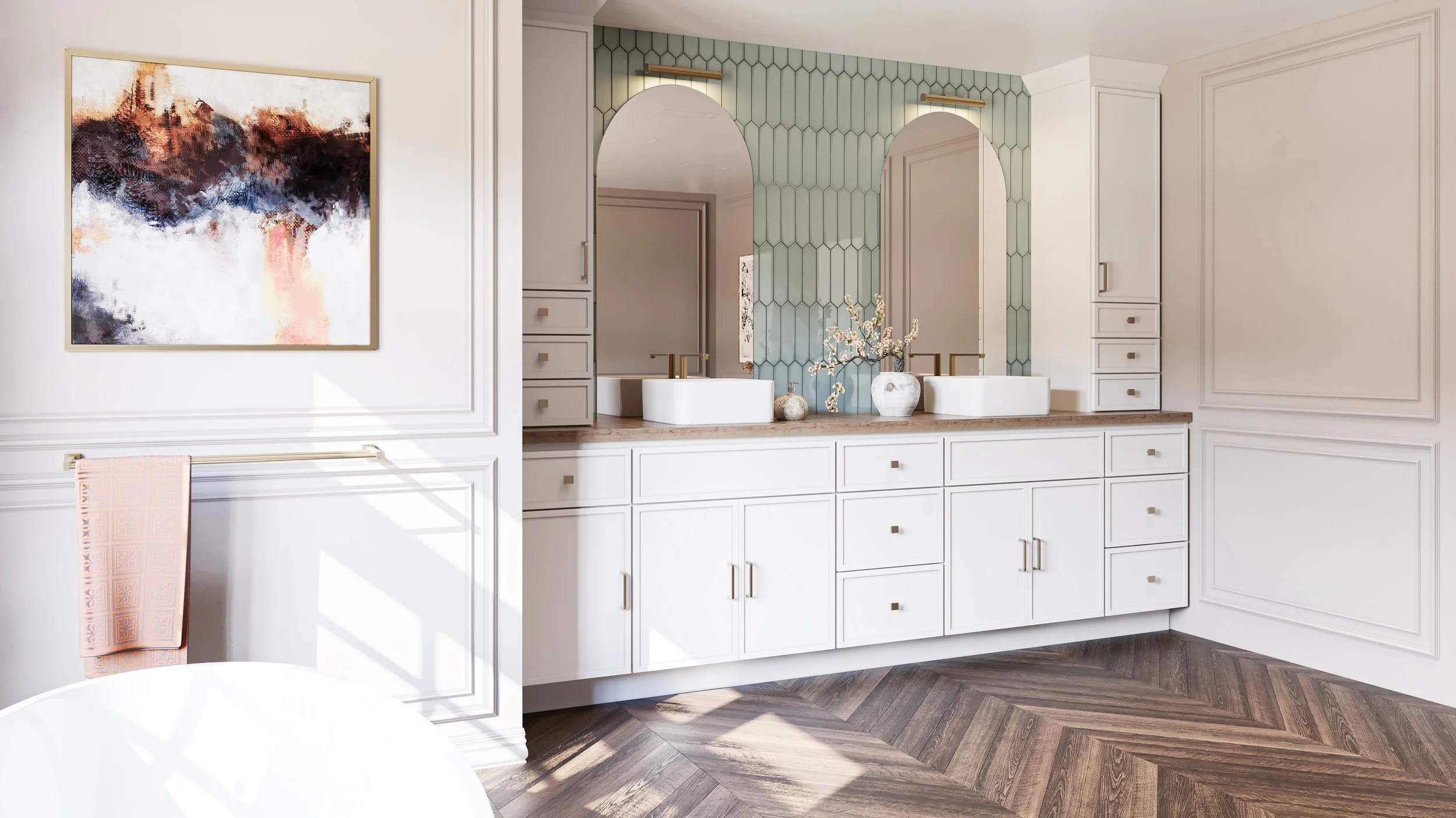 A modern bathroom with a double vanity, white cabinets, and a wood countertop. There are two large mirrors with gold accents and two sinks. A decorative vase with flowers and smaller decorative objects are placed on the countertop. The wall behind the mirrors has hexagonal tile in a light color. There is an abstract painting on the left wall and a towel hanging on a gold towel rack.