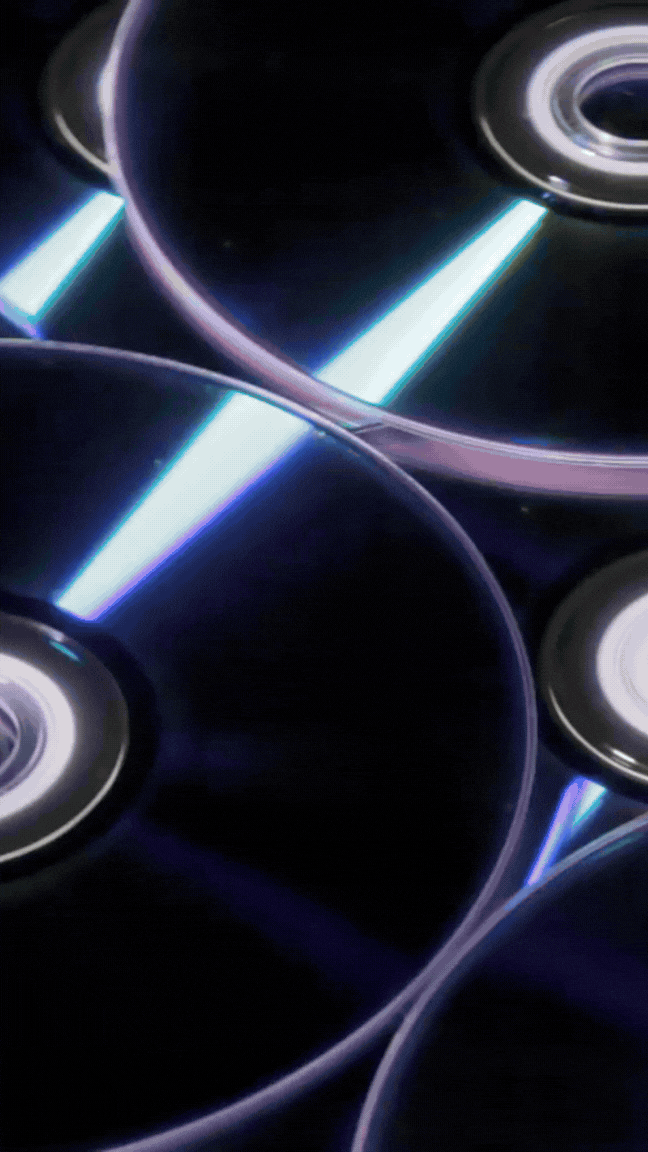 Close-up of computer cooling fans with illuminated blue accents.
