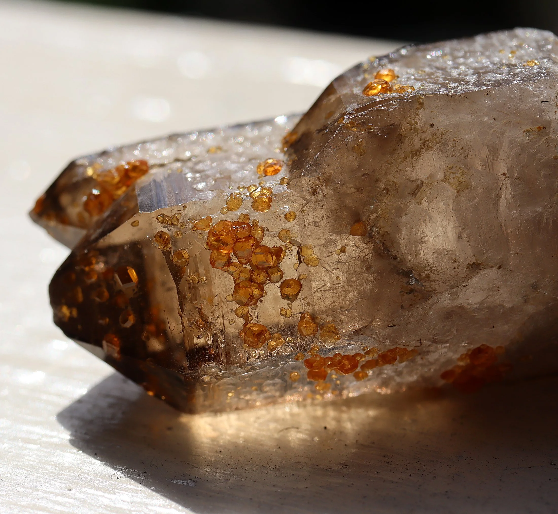 Spessartine Garnet with smoky quartz. Wushan Spessartine Mine, Tongbei, Yunxiao Co., Fujian Prov., China