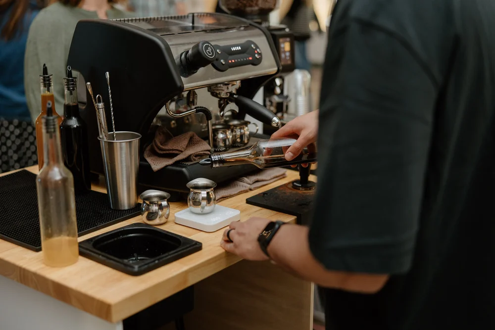 Barista pulling espresso at the Slow Sunday coffee cart