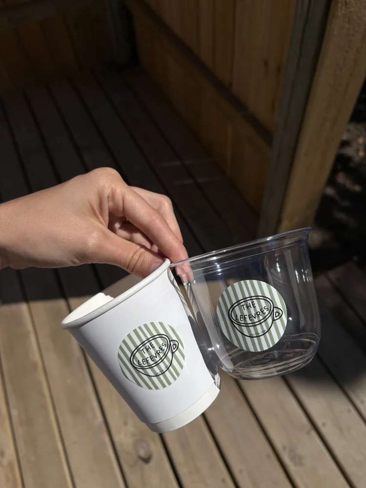 Custom sticker coffee cups from a Slow Sunday event