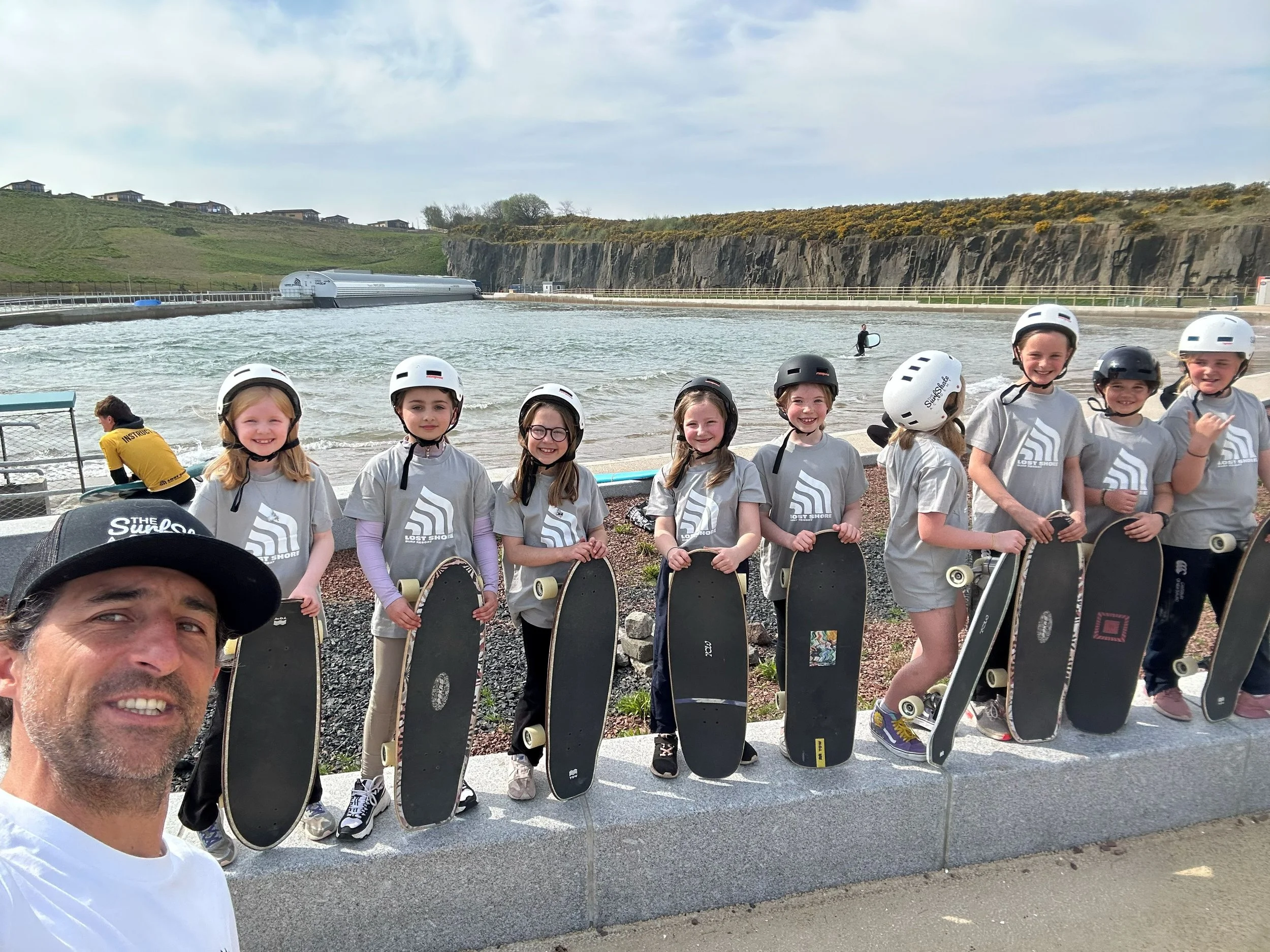 kids with surfskate boards