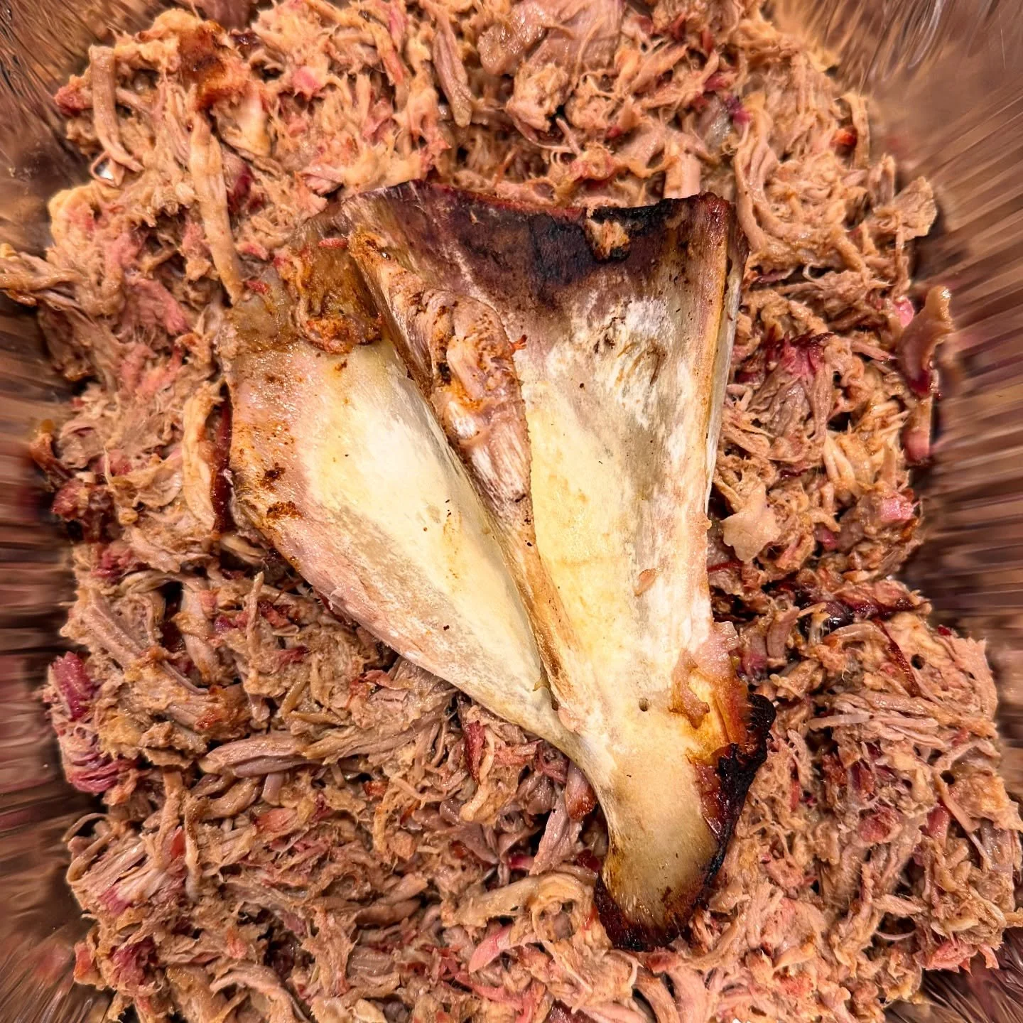 A clean bone pull is always a beautiful sight! Pulled pork off the @blackstoneproducts 900 Pellet Smoker is a crowd favorite! Check out my previous reel for how I make it! #blackstone #griddlecrew #pulledpork #pelletsmoker #backyardbbq