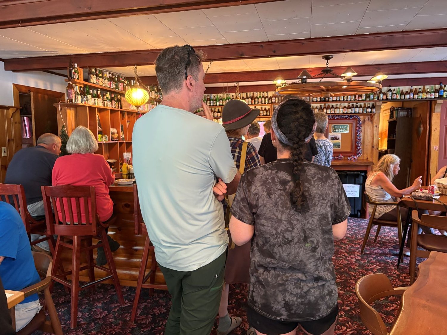 People waiting in line to order at food at the Monday Tuesday Grill in Upper Jay.