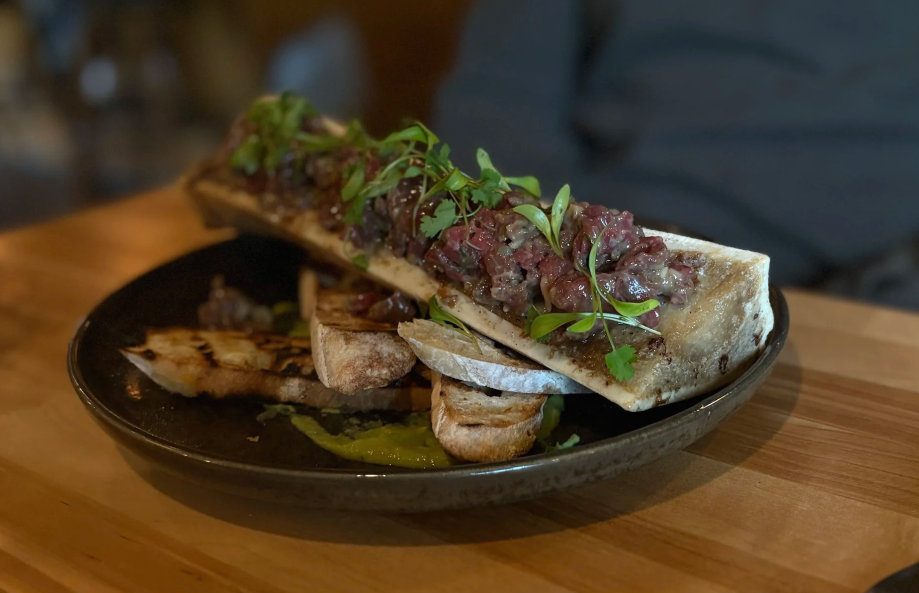 Beef tartar in marrow bone from Sentinel & Station in Lake Placid.