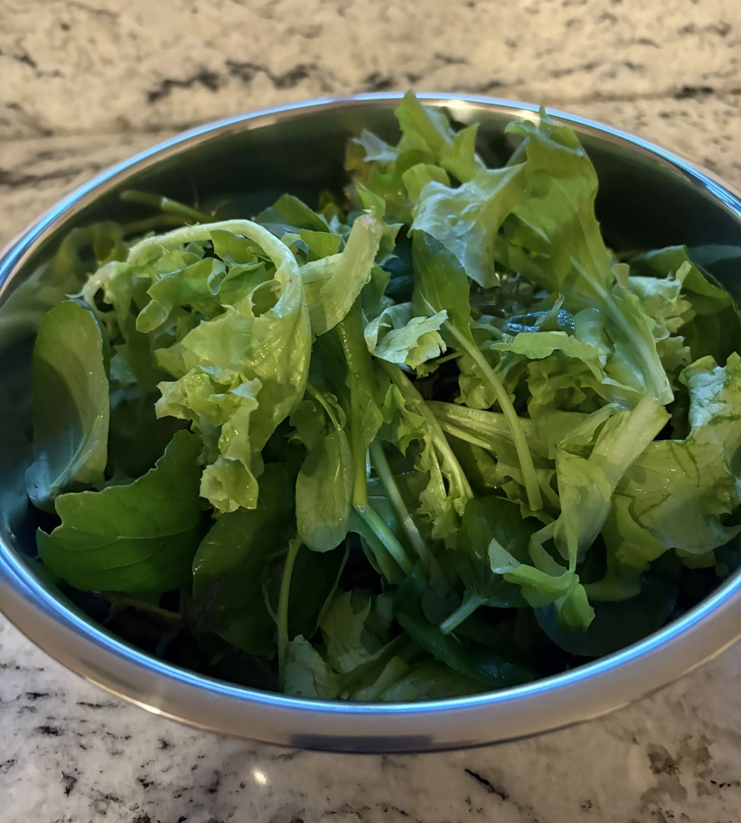 Mixed greens in a bowl