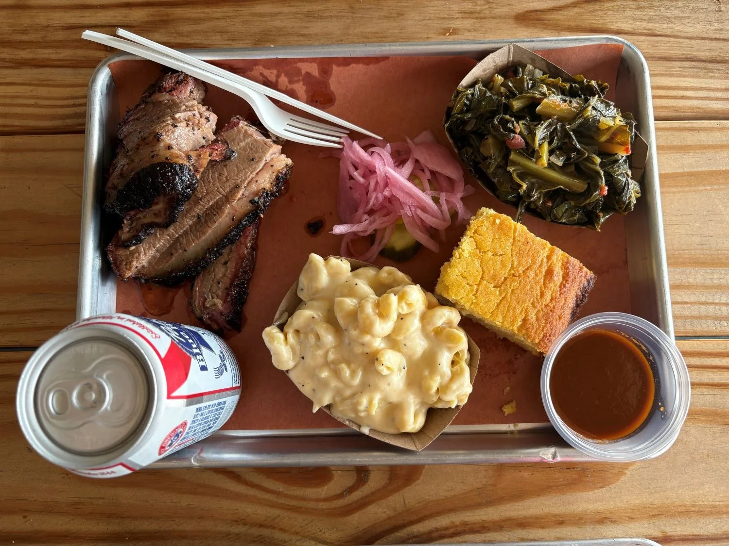 Brisket and sides on a ha;f sheet pan from West Shore BBQ