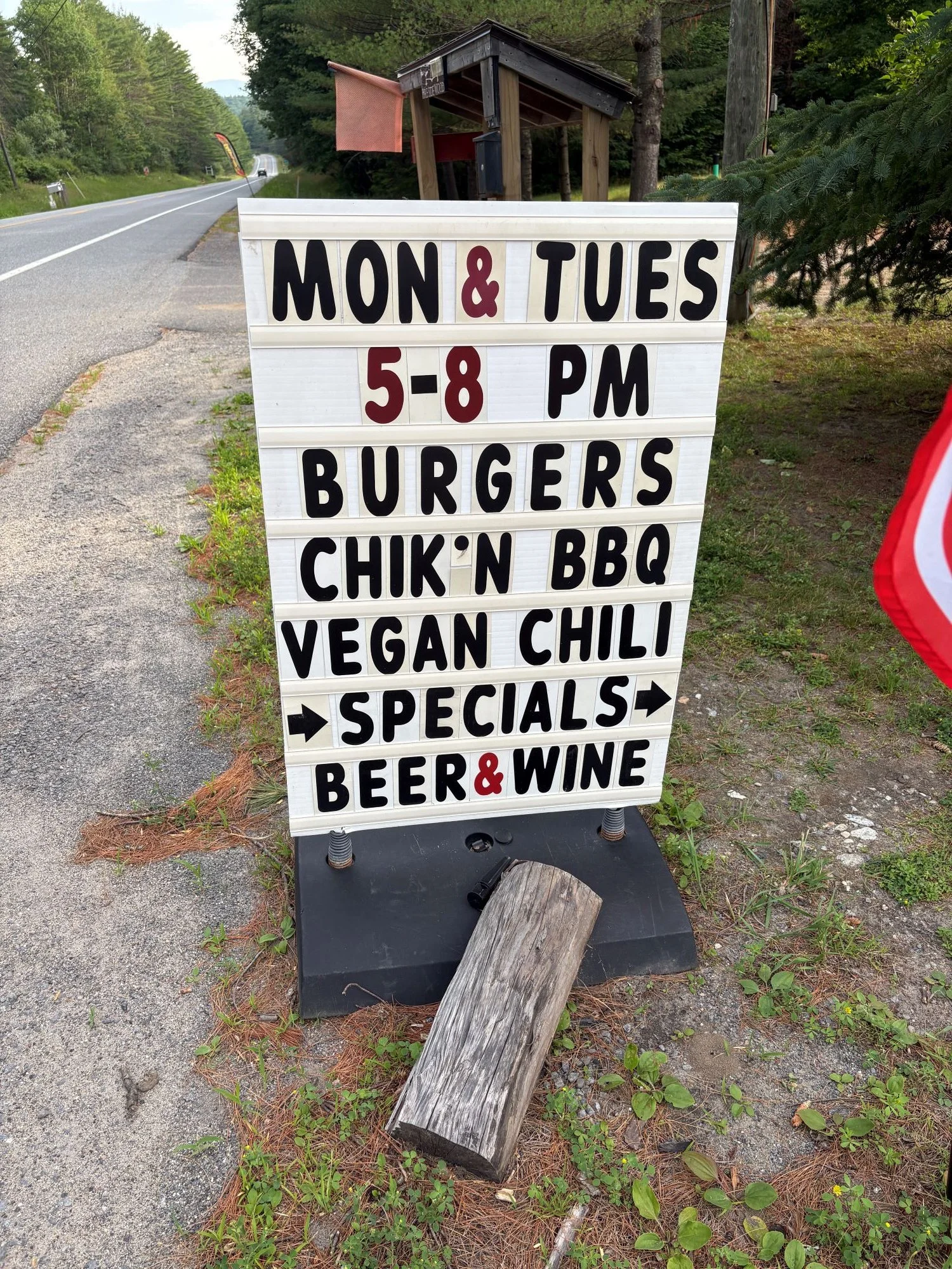 A sign for a restaurant in Upper Jay called the Monday Tuesday Grill.