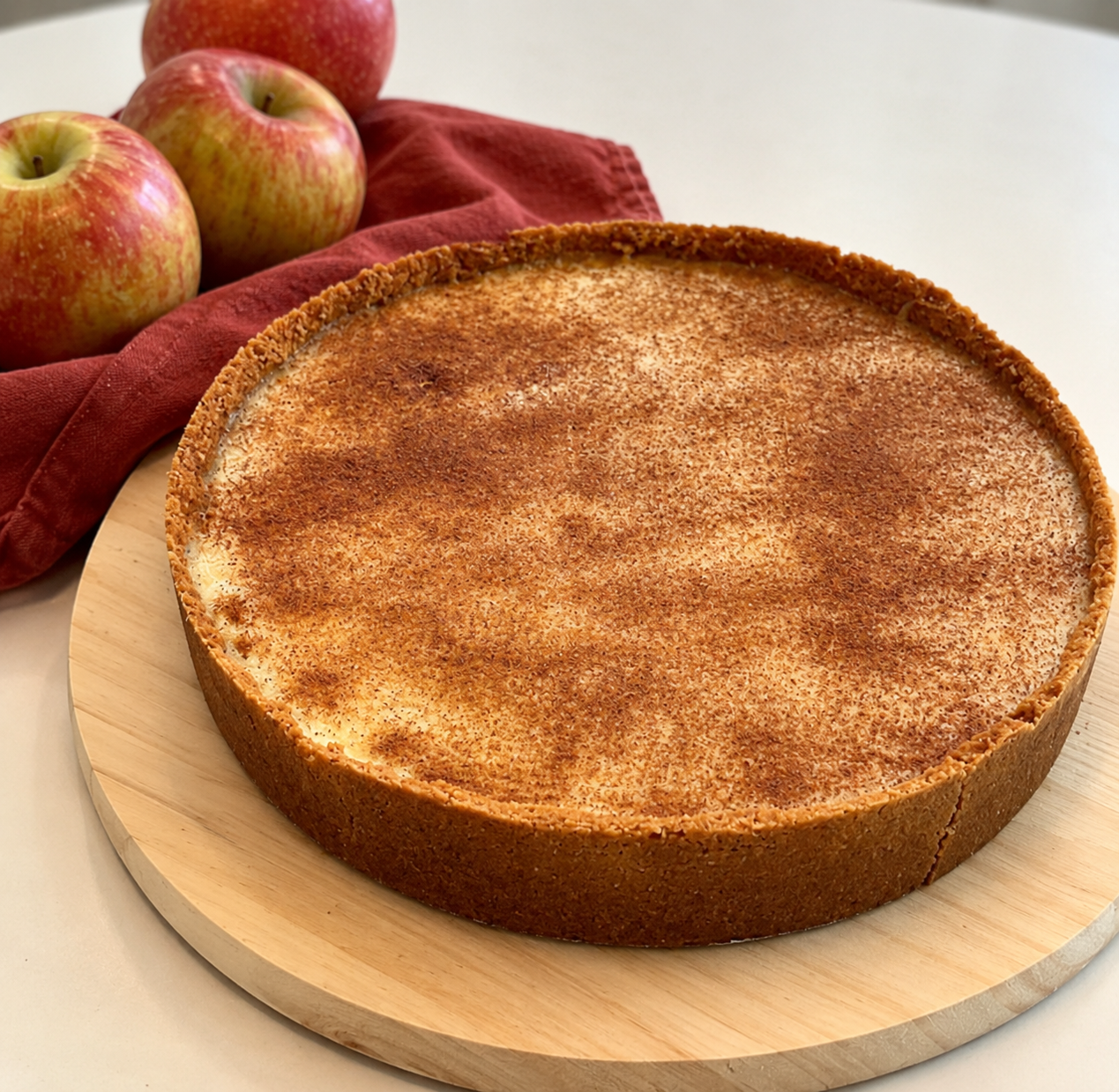 Cinnamon-Dusted Apple Tart on Wood.png