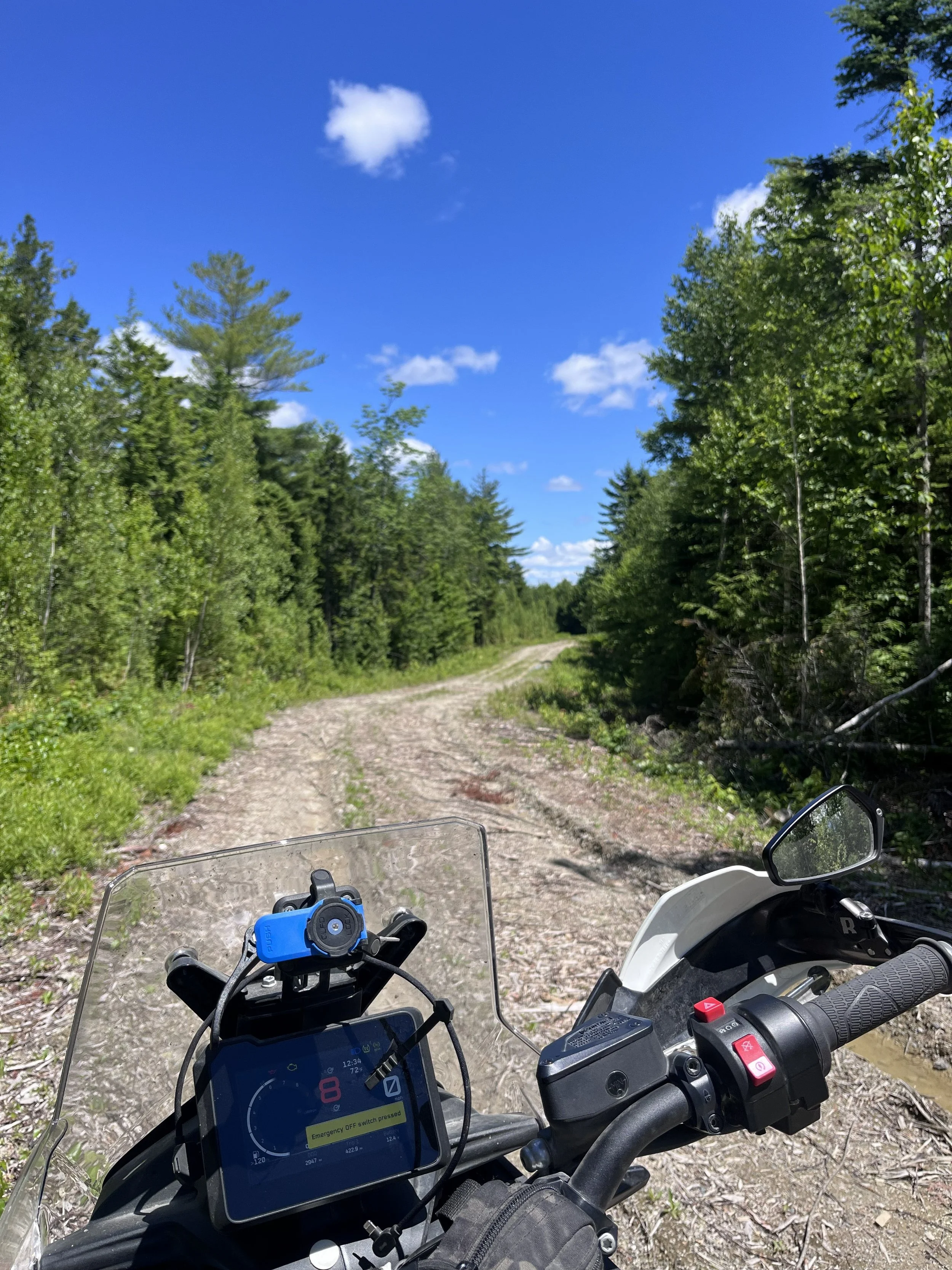 Adventure motorcycle riders  in Downeast Maine during a guided Northbound Moto tour